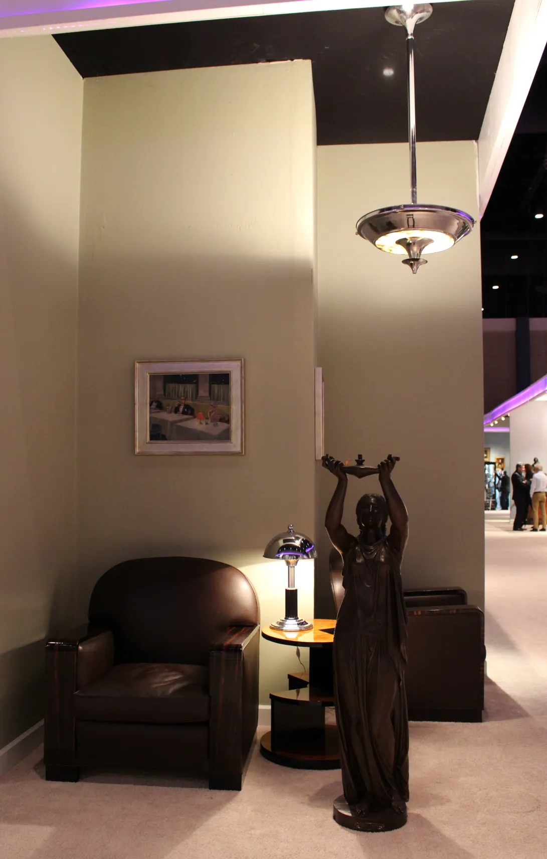 Two antique hanging lamps brighten a cozy corner.