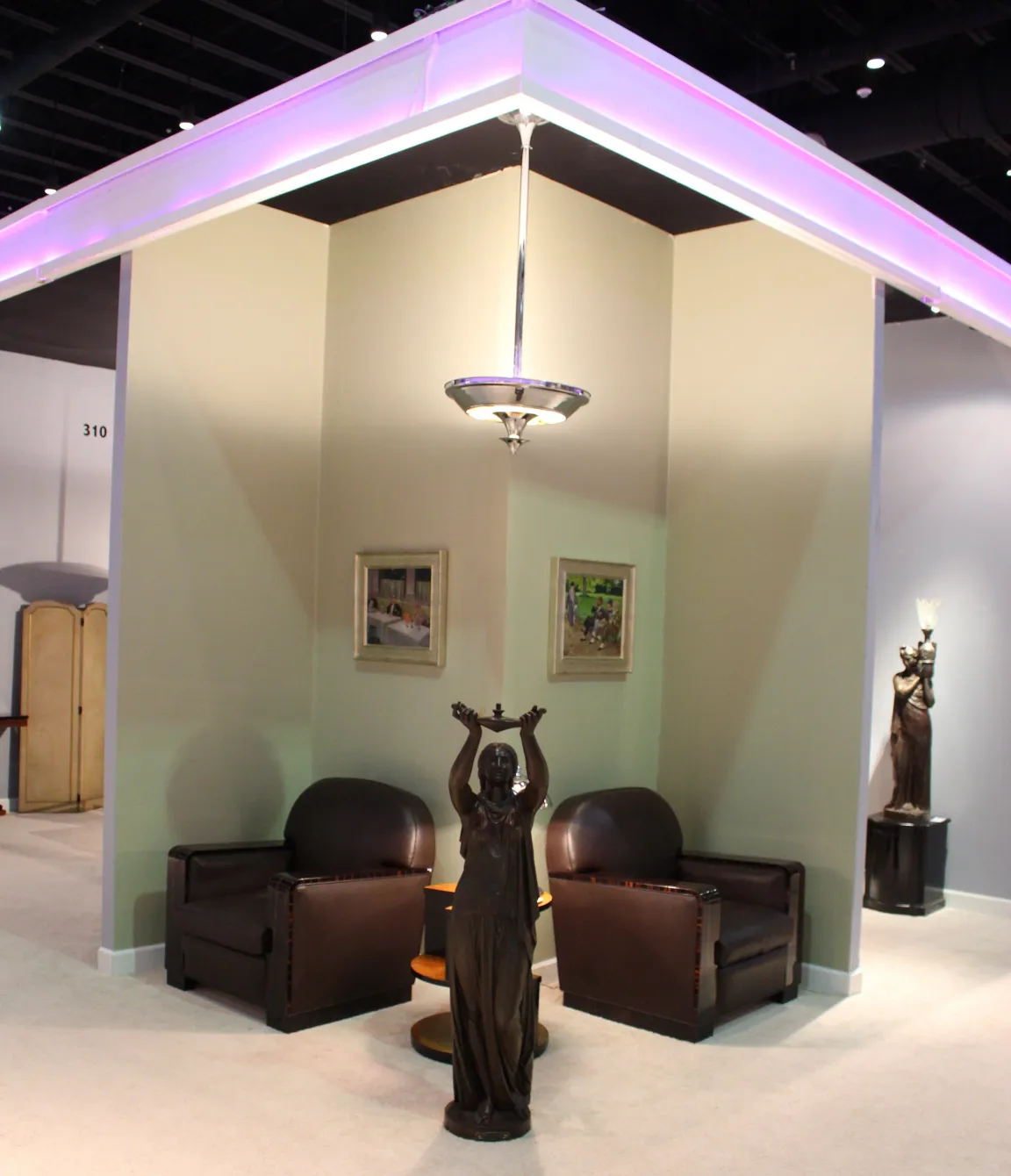 Two hanging lamps in Art Deco style within an antique setting.