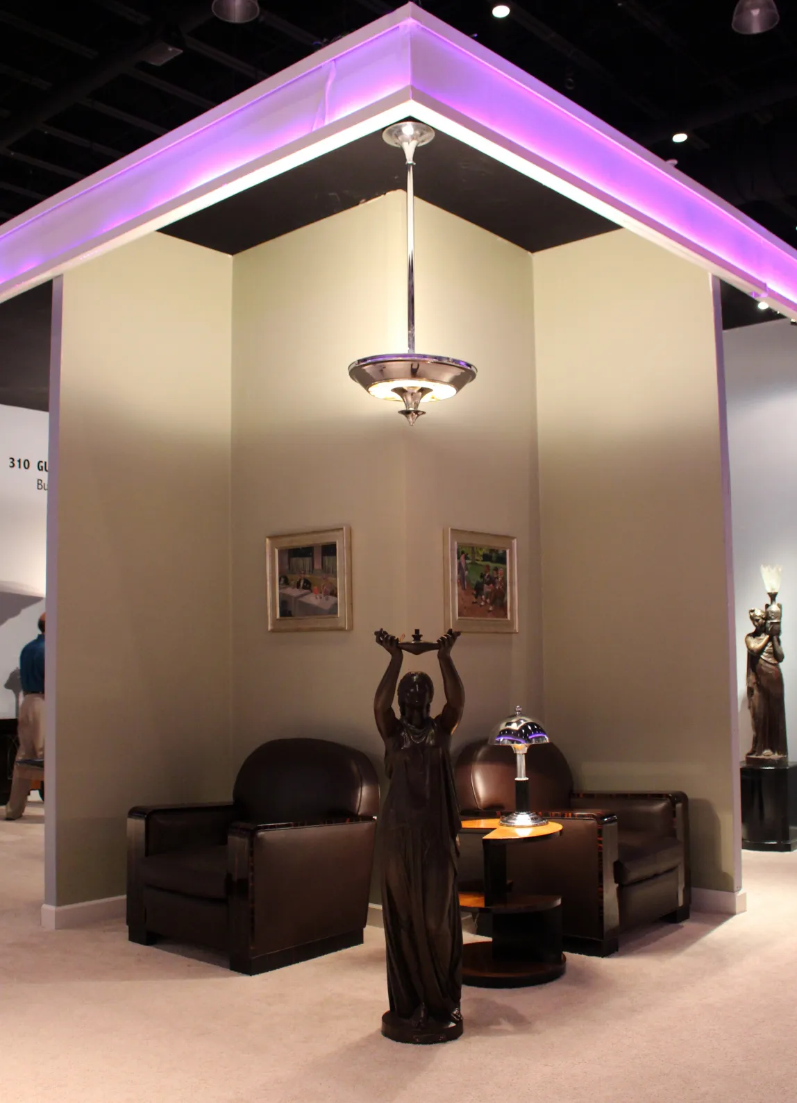 two antique art deco hanging lamps in a room