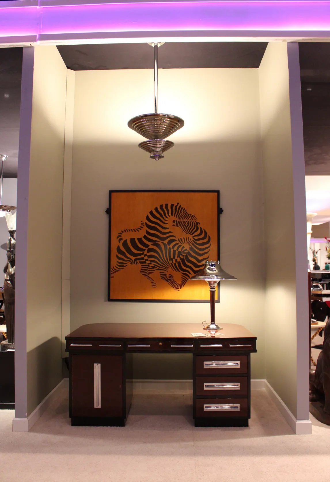 Antique art deco hanging lamp with elegant design in a modern setting.