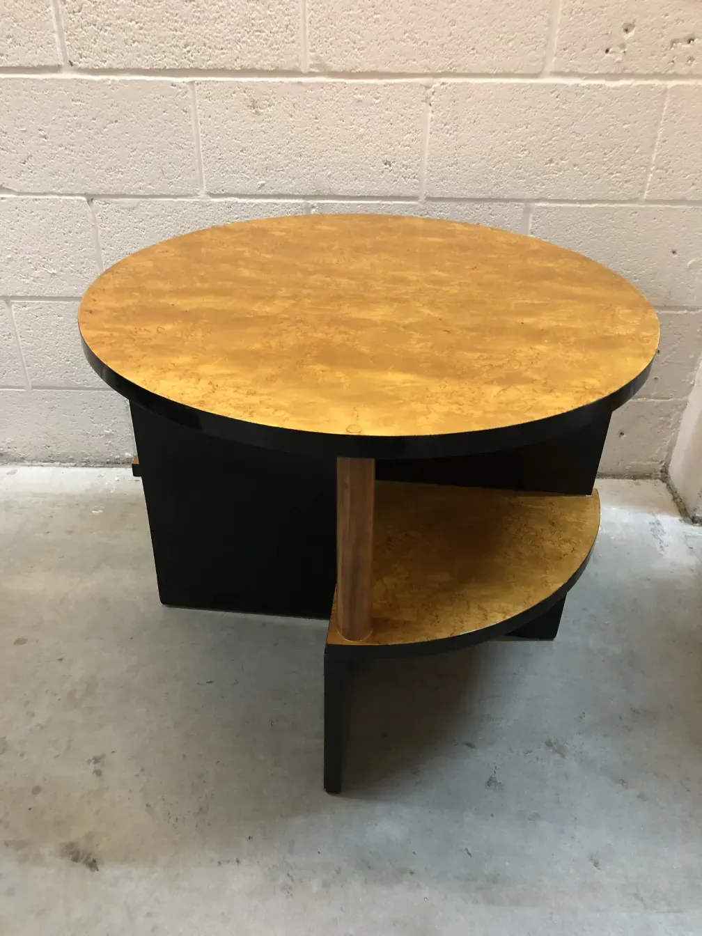 2 round antique small tables with a golden top