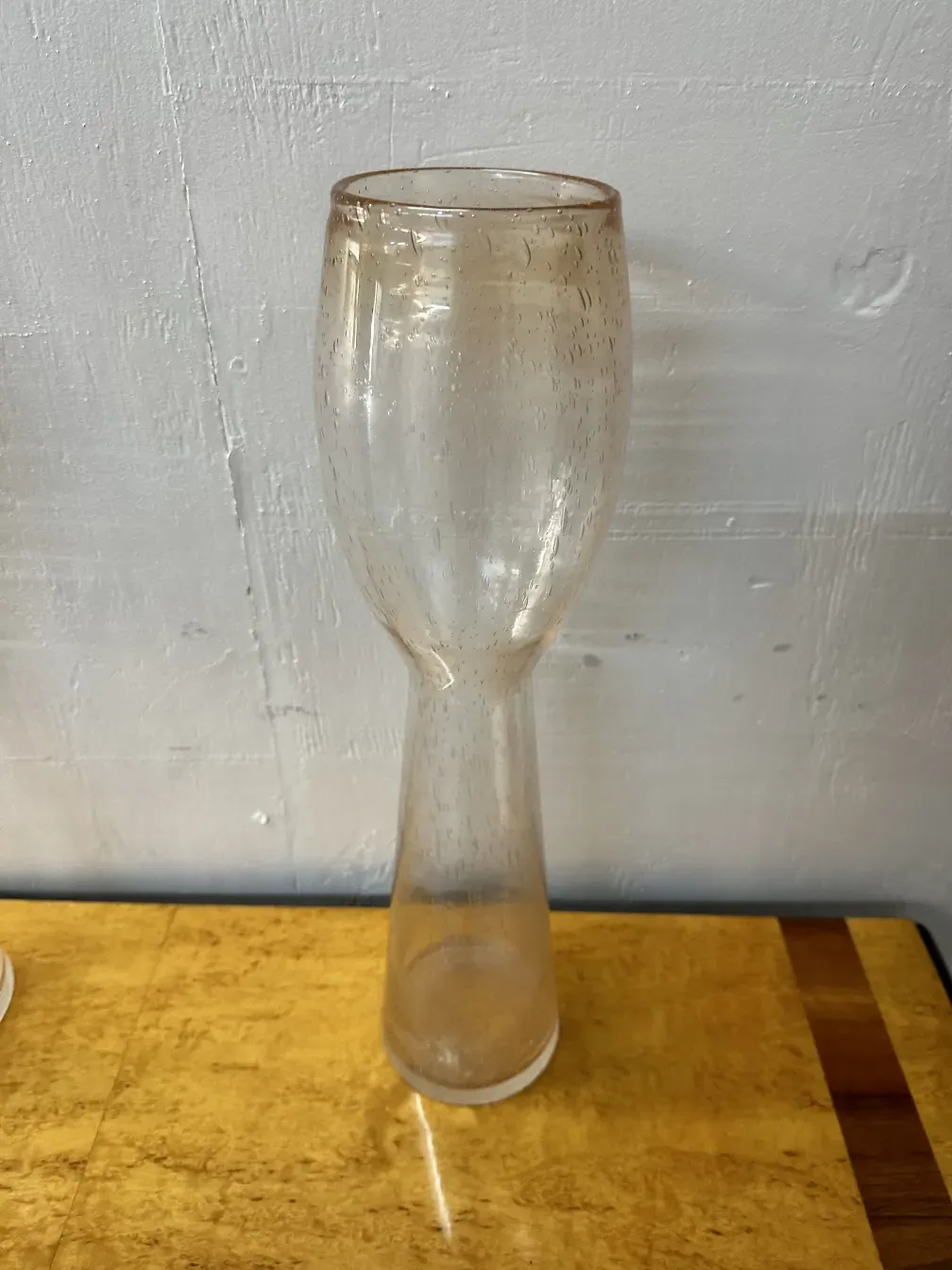 two antique decorative murano vases in a styled setting