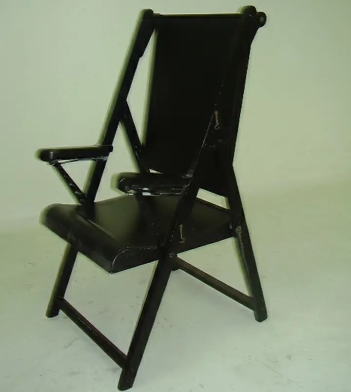 two antique armchairs to be restored in a light setting