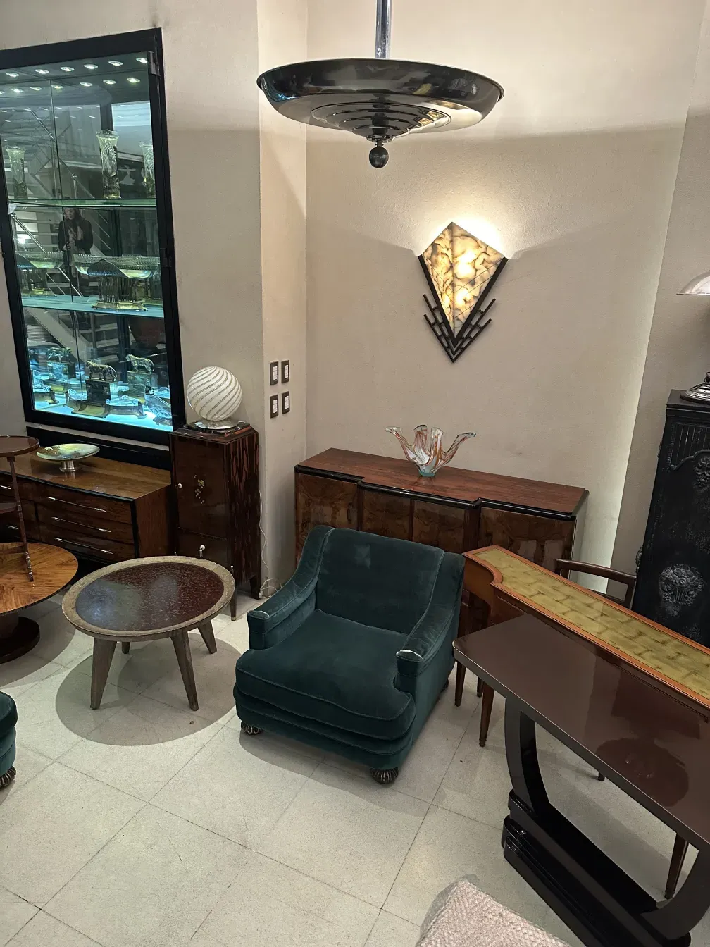 Two antique armchairs in a restoration setting, need repair