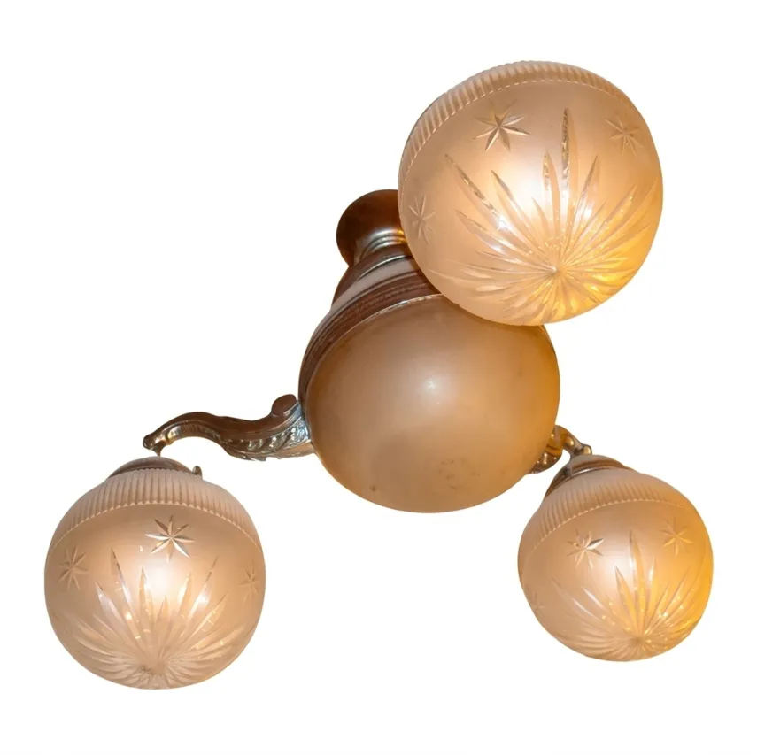 antique hanging lamp with three frosted bulbs