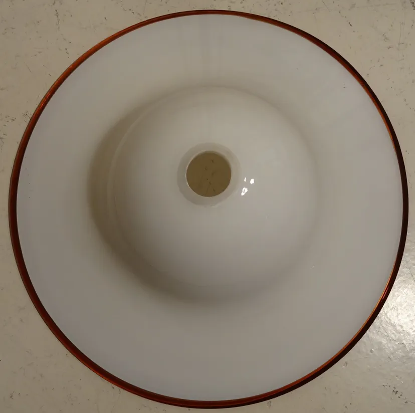 Antique hanging lamp featuring a white design and visible brown border.