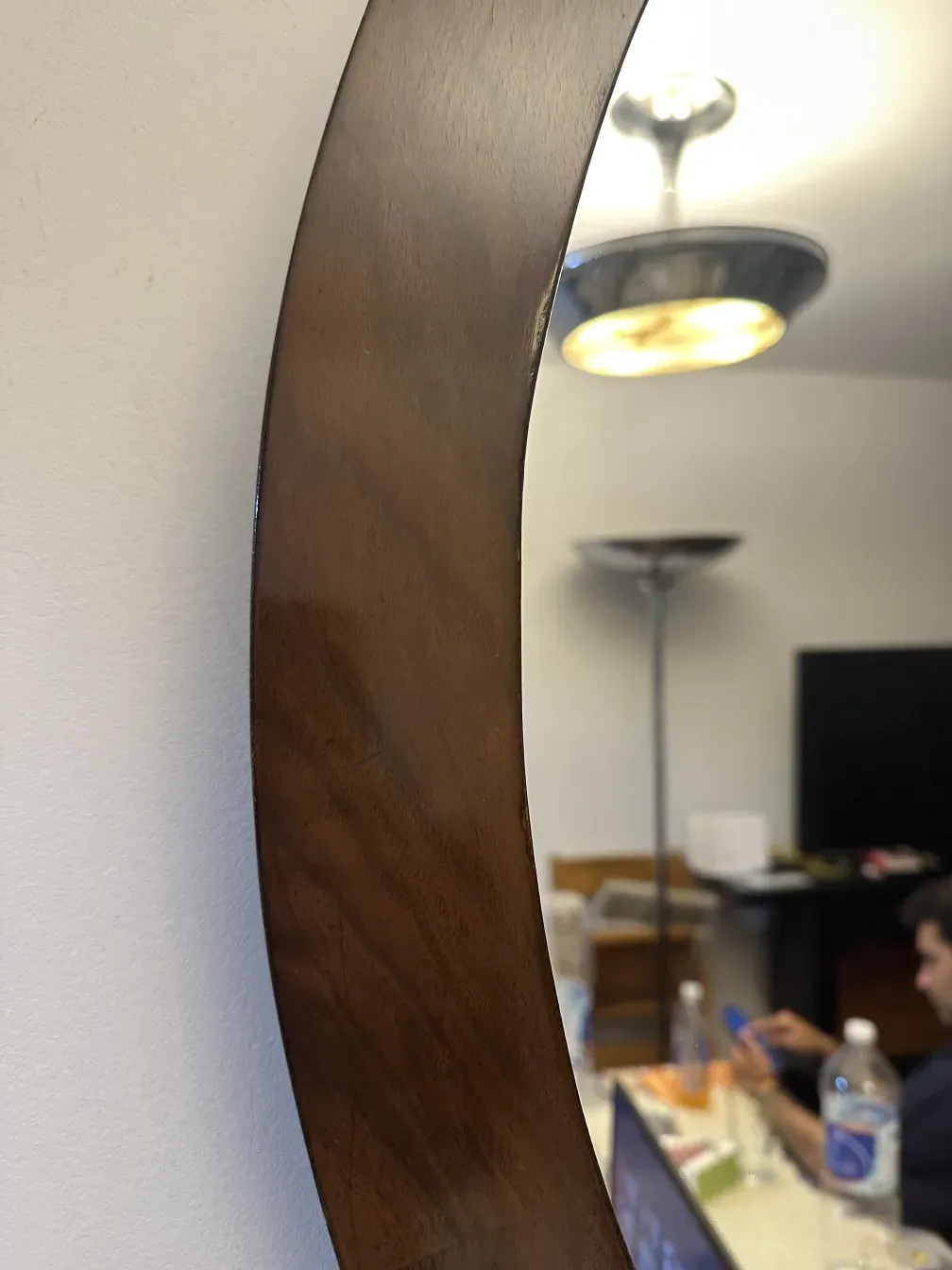 antique art deco mirror with an elegant edge