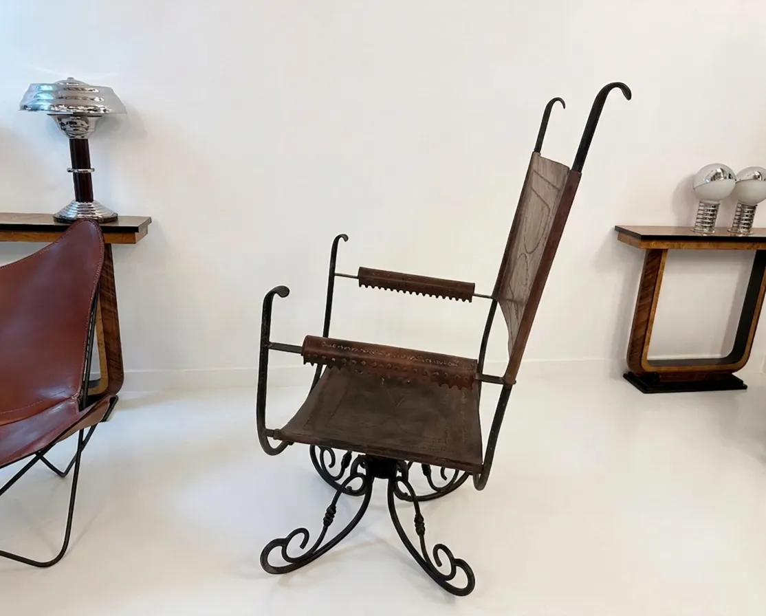 Antique armchair featuring unique design in modern setting.