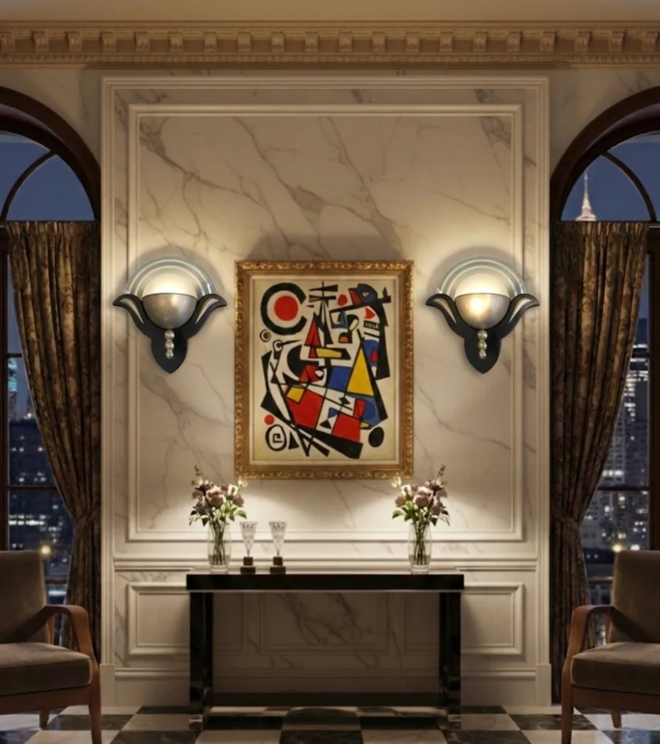 Pair of antique sconces in an elegant living room with art