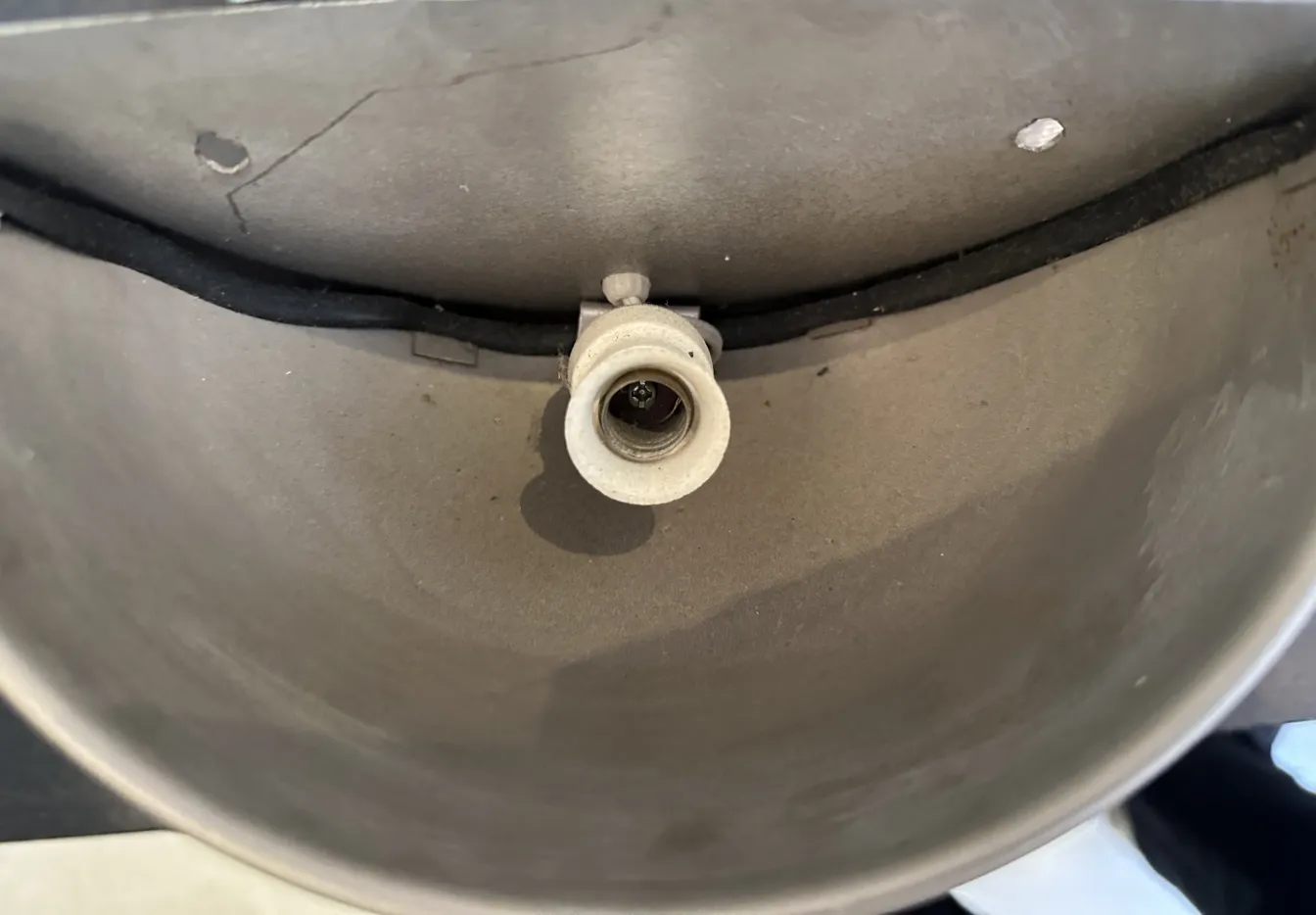 Top view of an antique pair of sconces with a detailed base