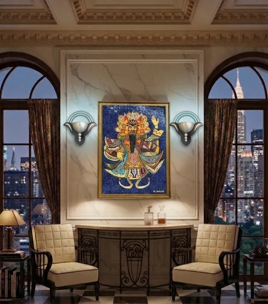 Antique pair of sconces lighting an elegant room