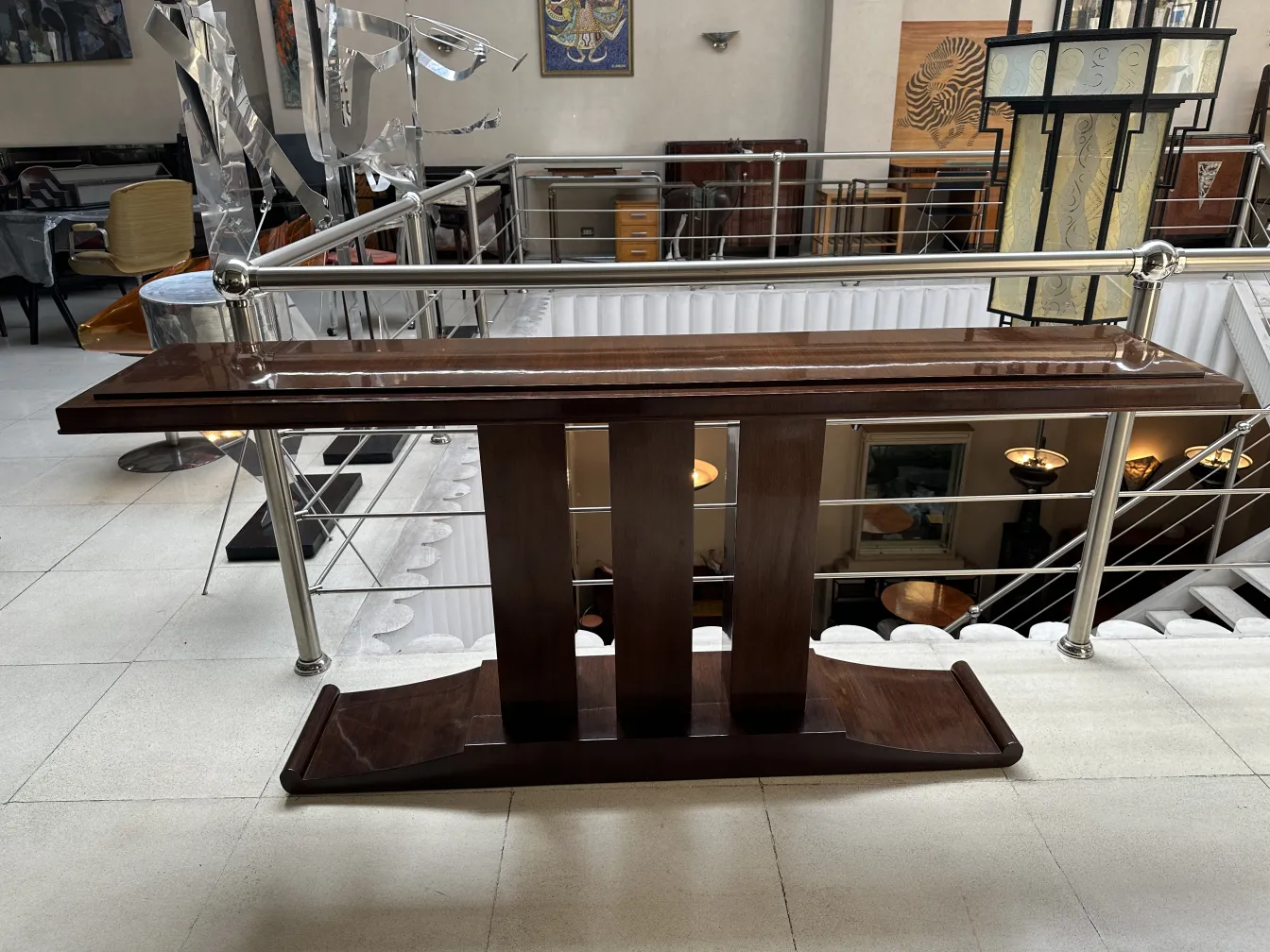 View of an antique console with elegant design in a modern setting