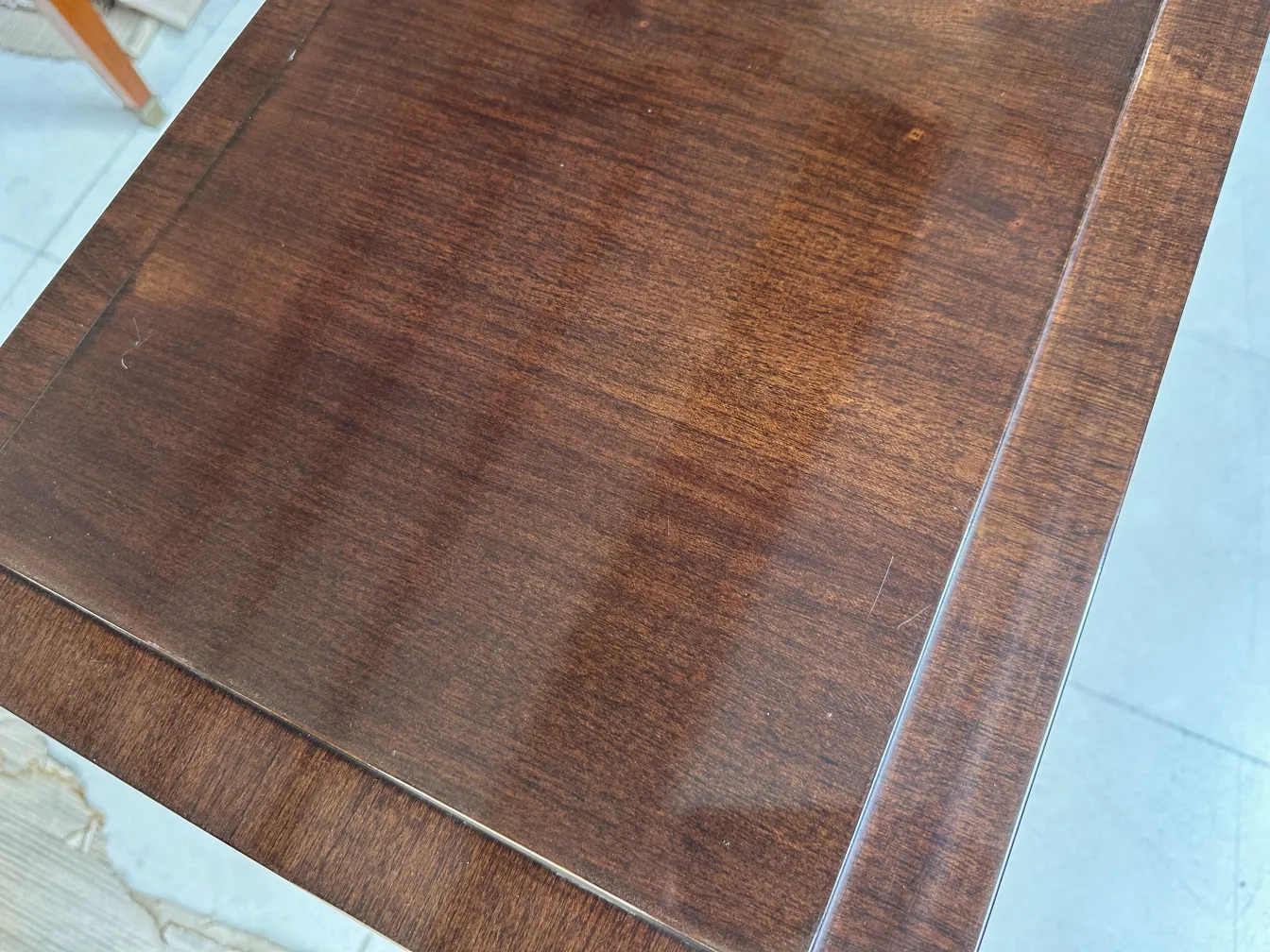 surface of antique console with glossy and smooth finish