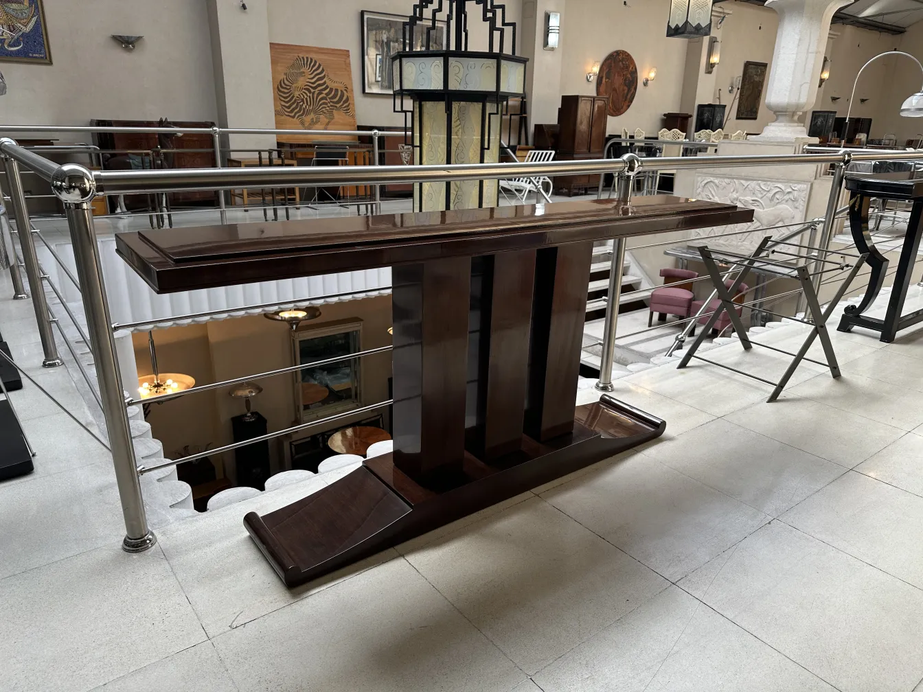 view of an elegant antique console in a spacious setting