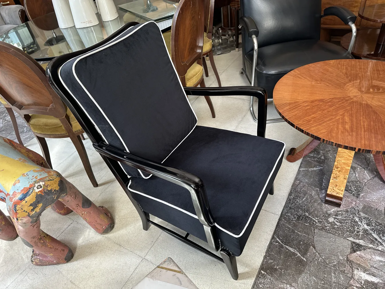 view of two antique armchairs with elegant details, vintage context