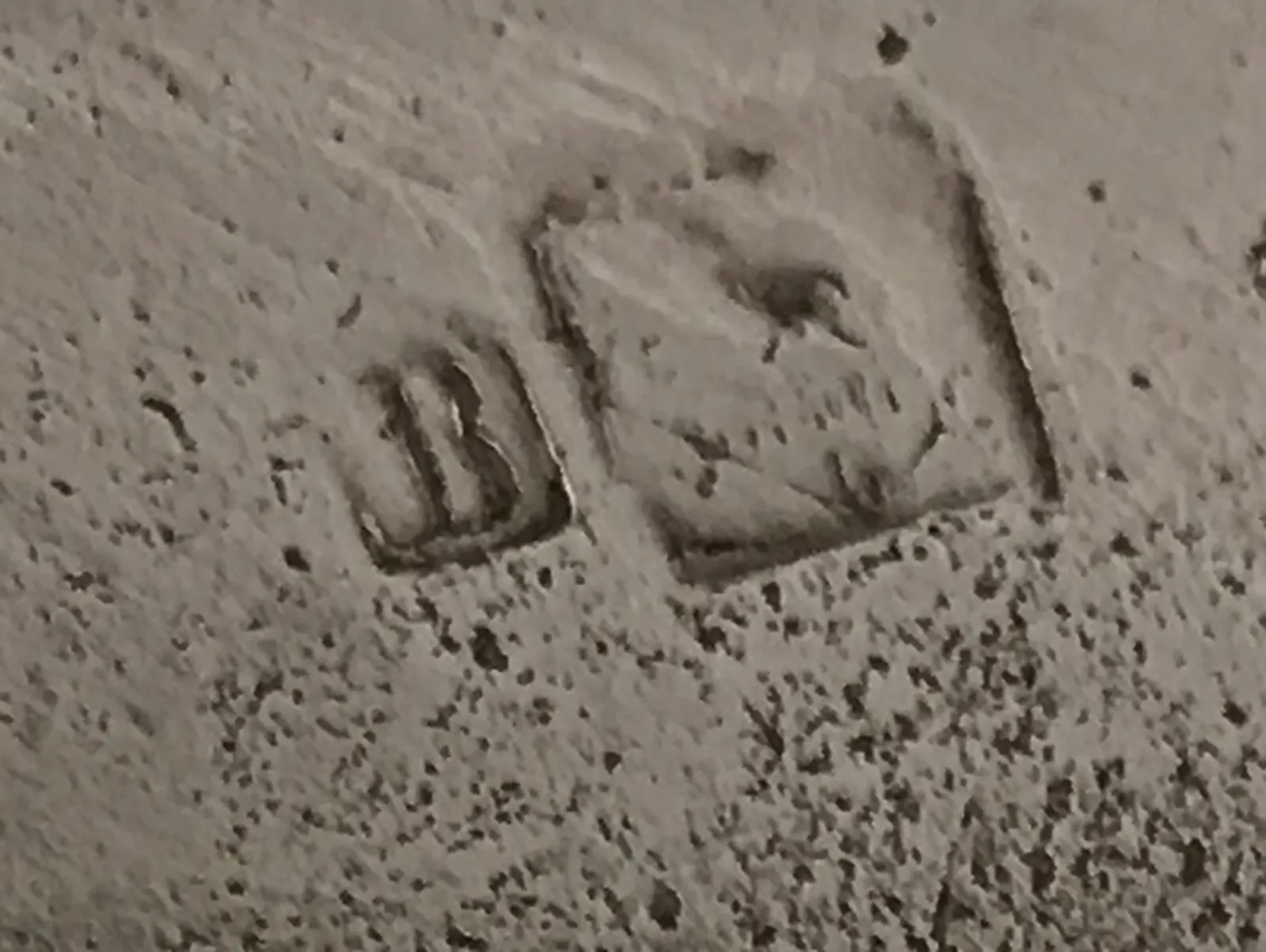 Detail of a stamp on an antique card tray WMF