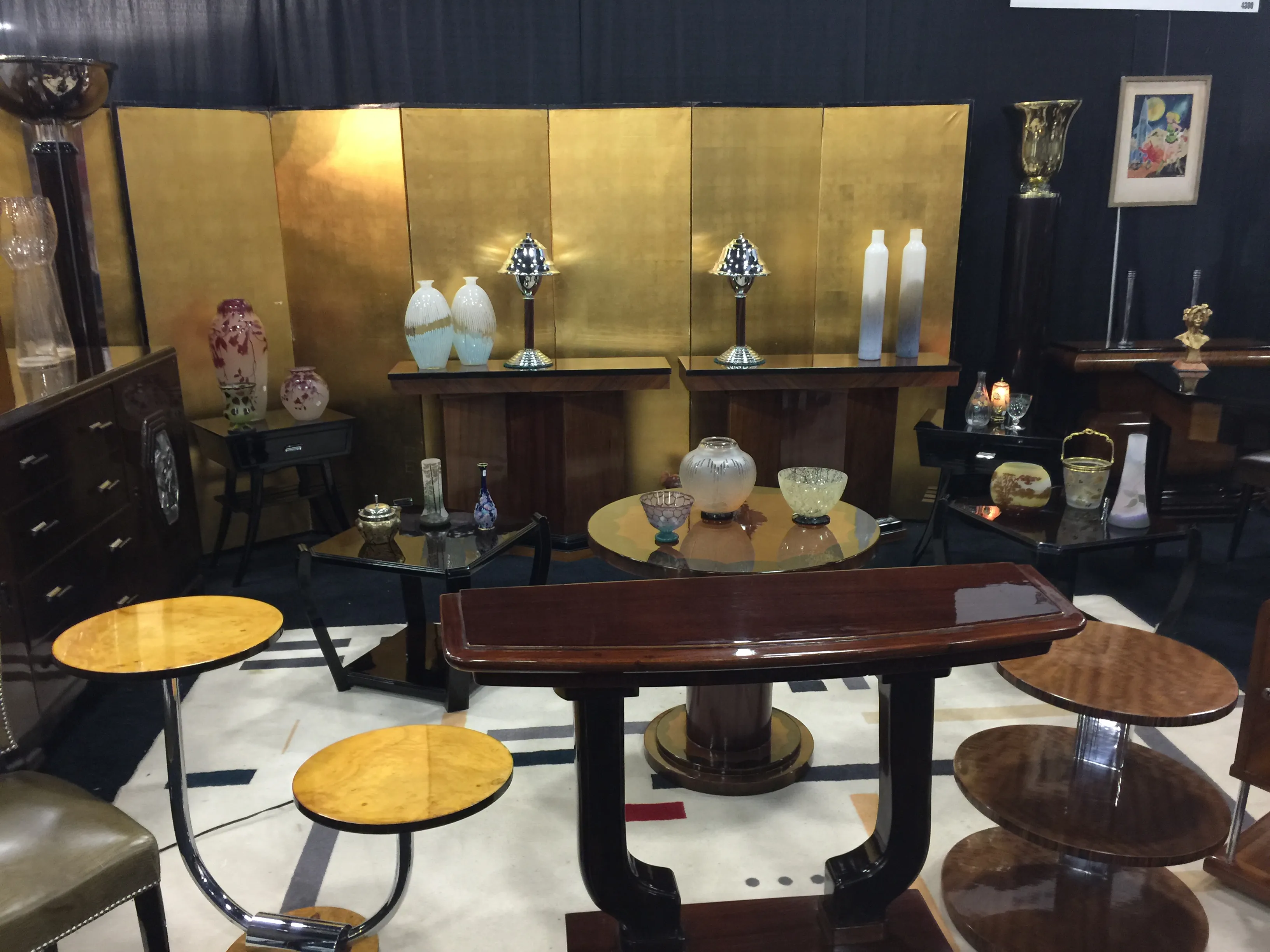 Antiques, two decorative Murano vases, various colors and shapes in an elegant setting.