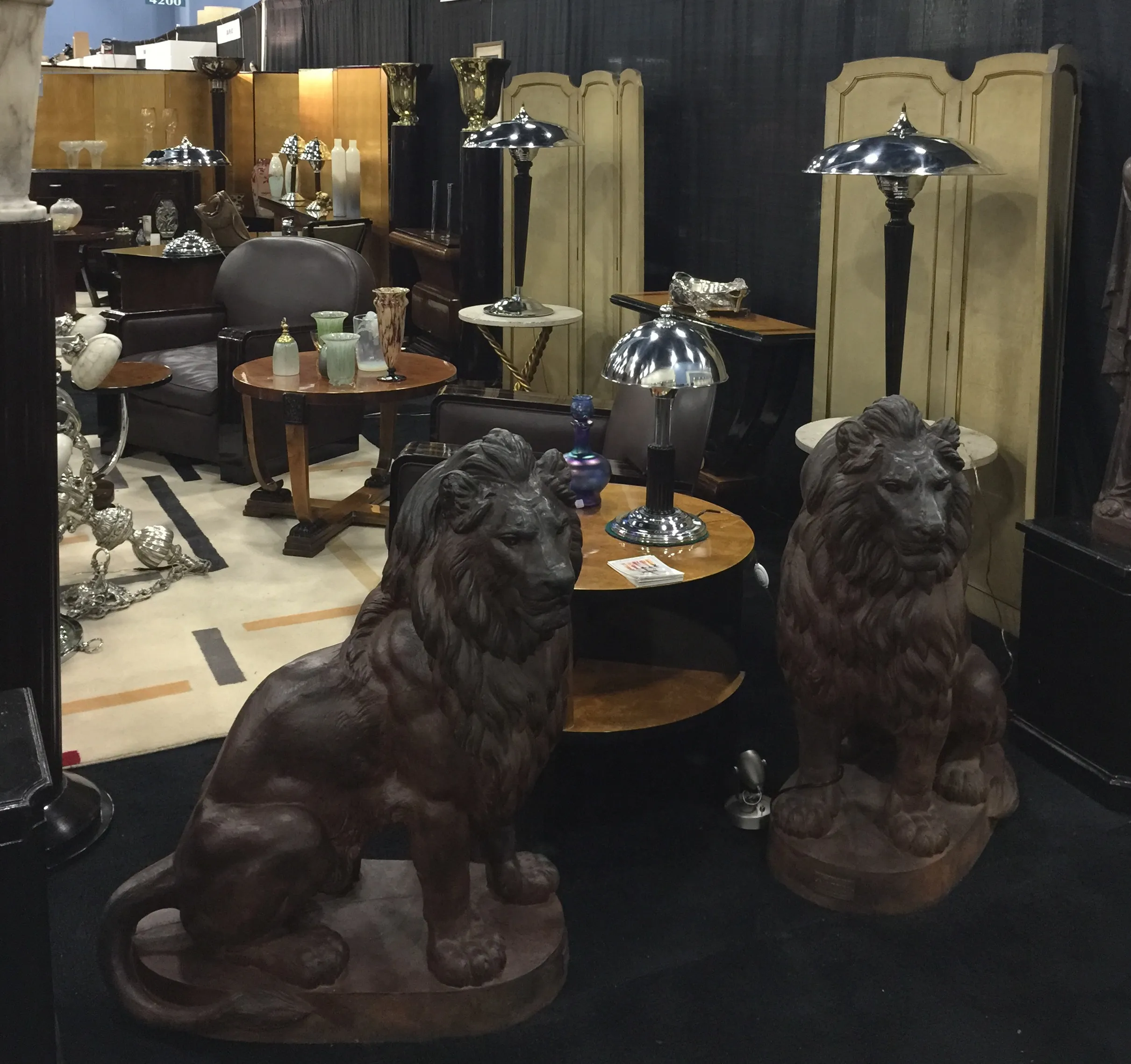 two antique lions in an elegant display