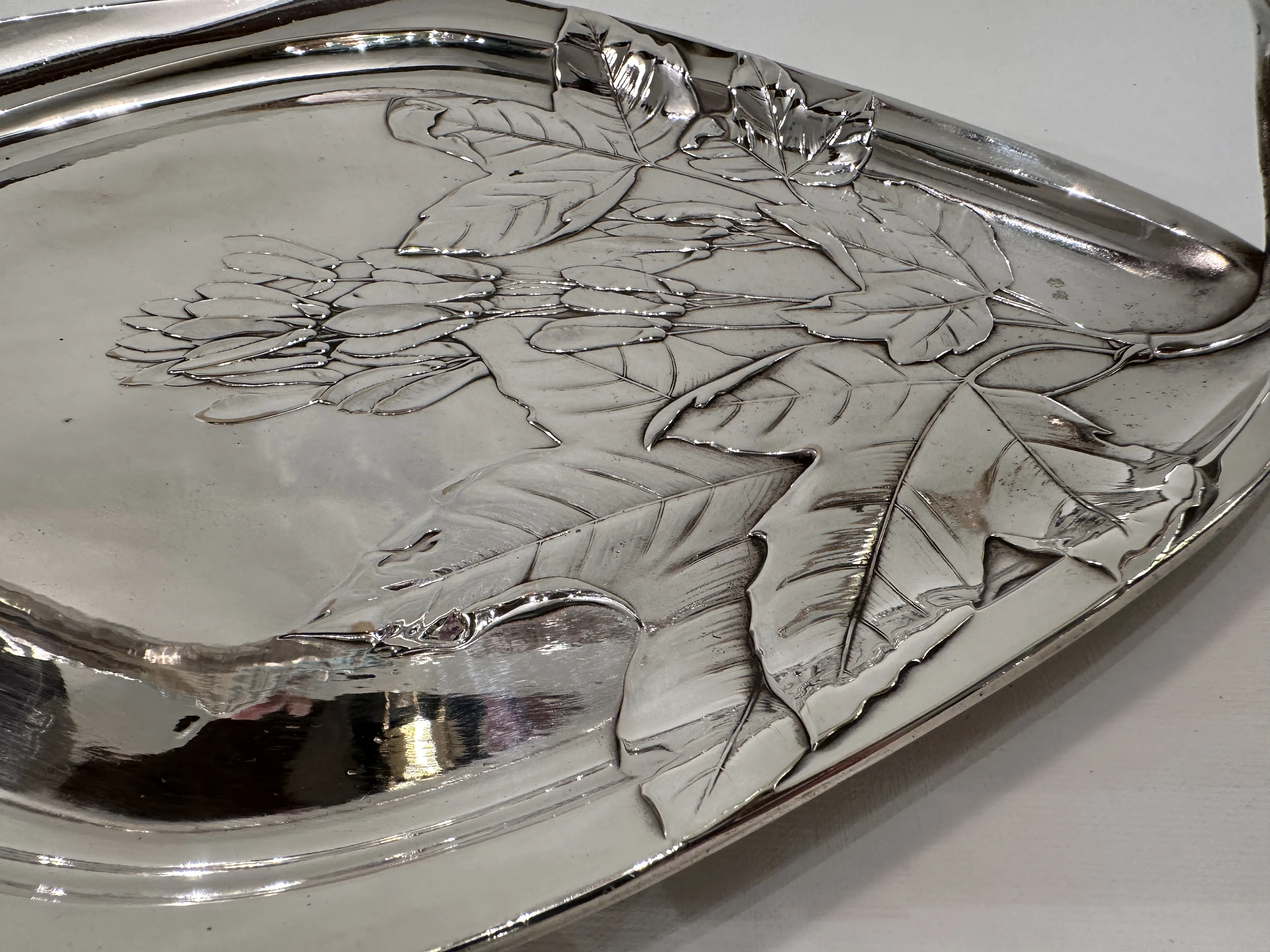 antique WMF card tray with detailed floral design