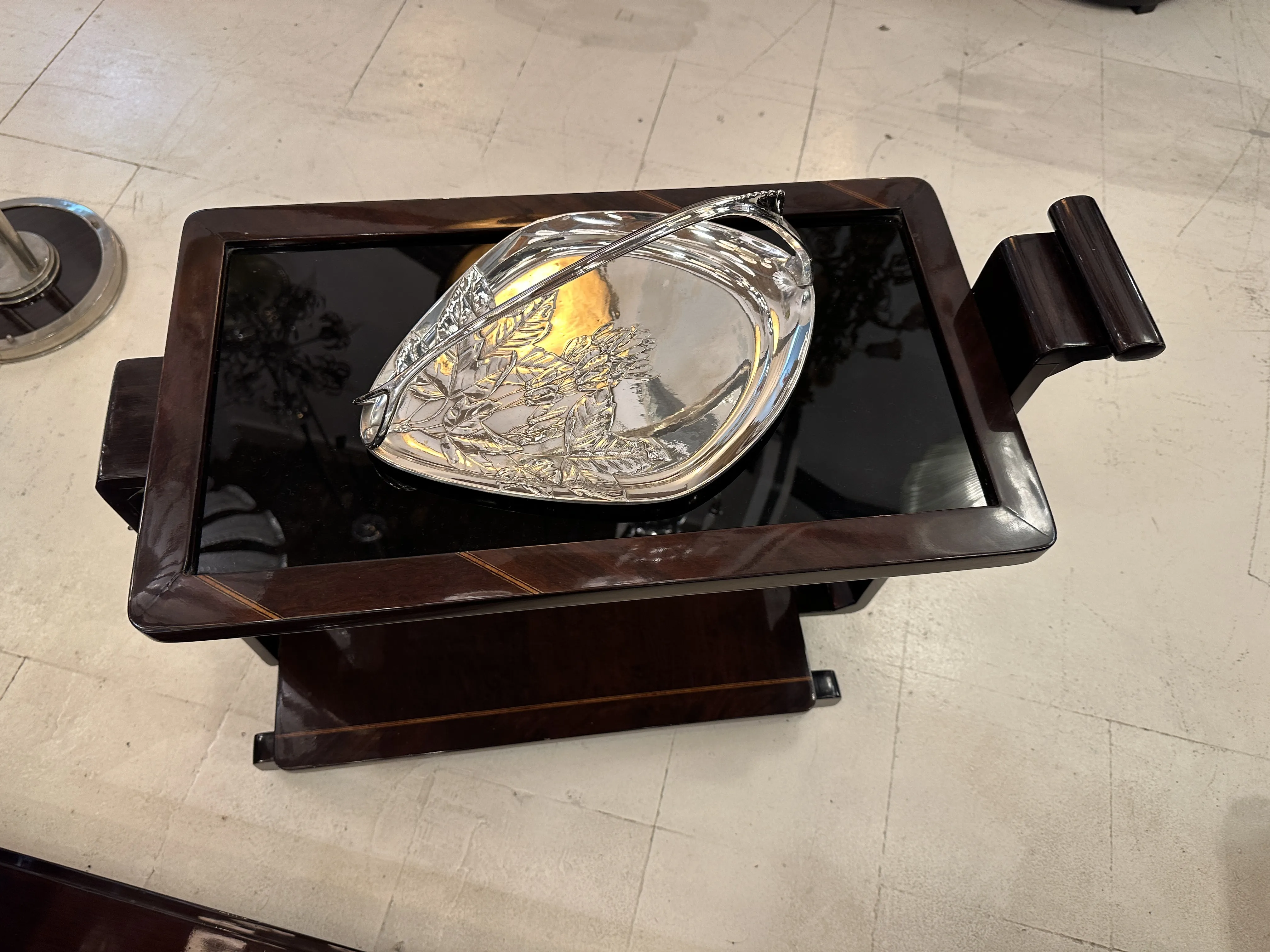antique card tray WMF with elegant design on black background
