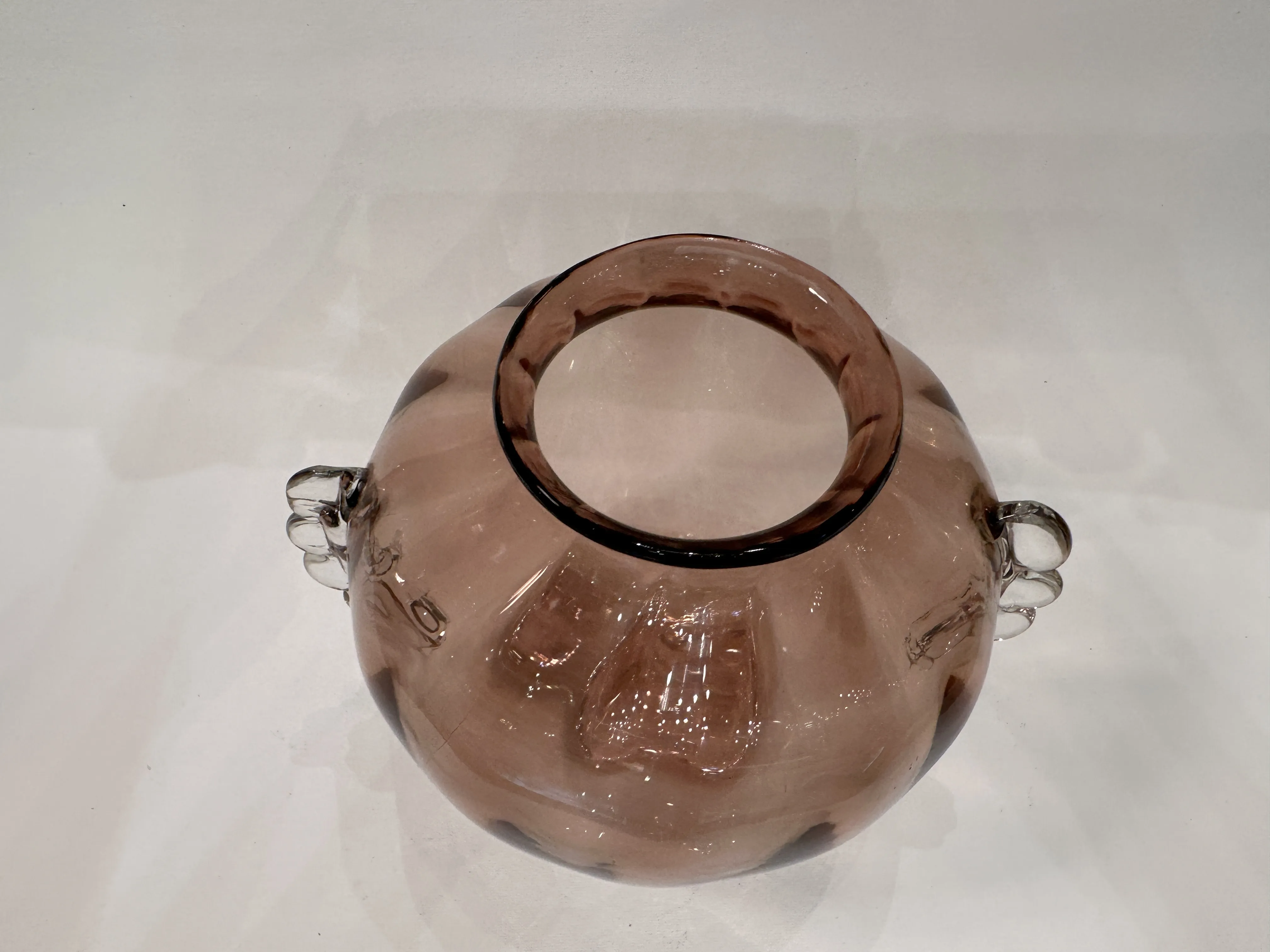 Top view of an antique Murano vase with elegant details and rounded shape.