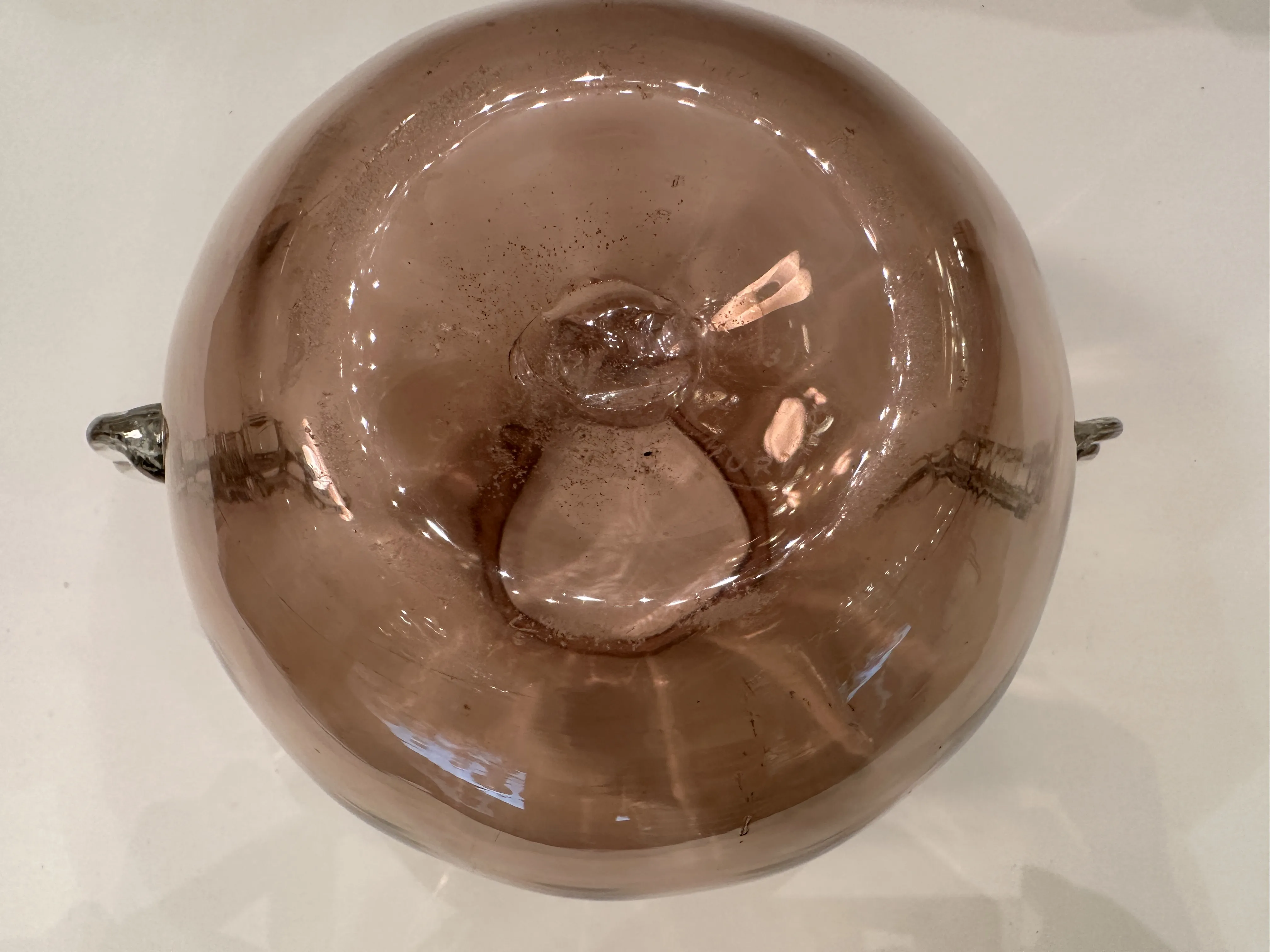 antique murano vase featuring a round and elegant design