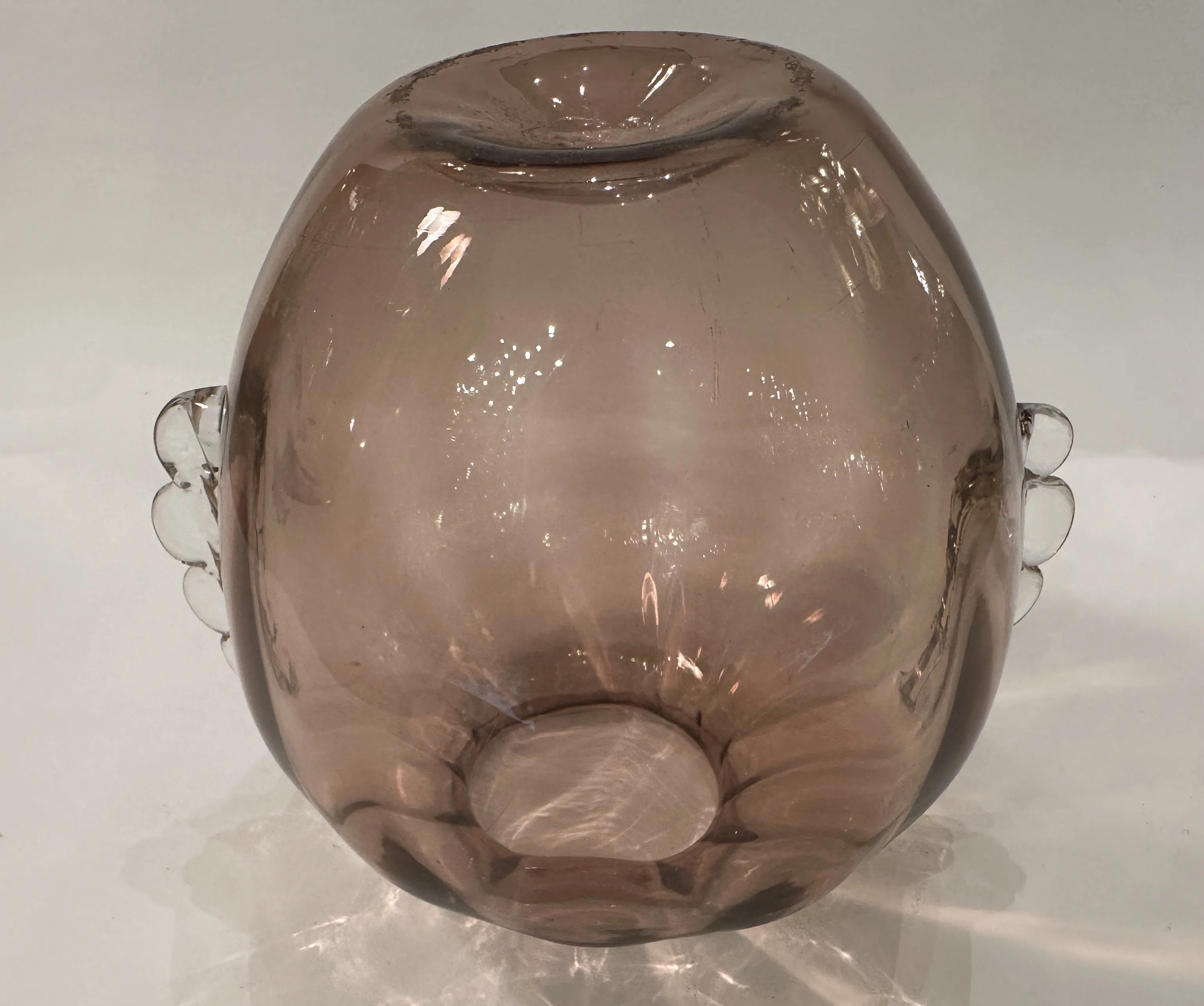 antique murano vase featuring an elegant shape and design details