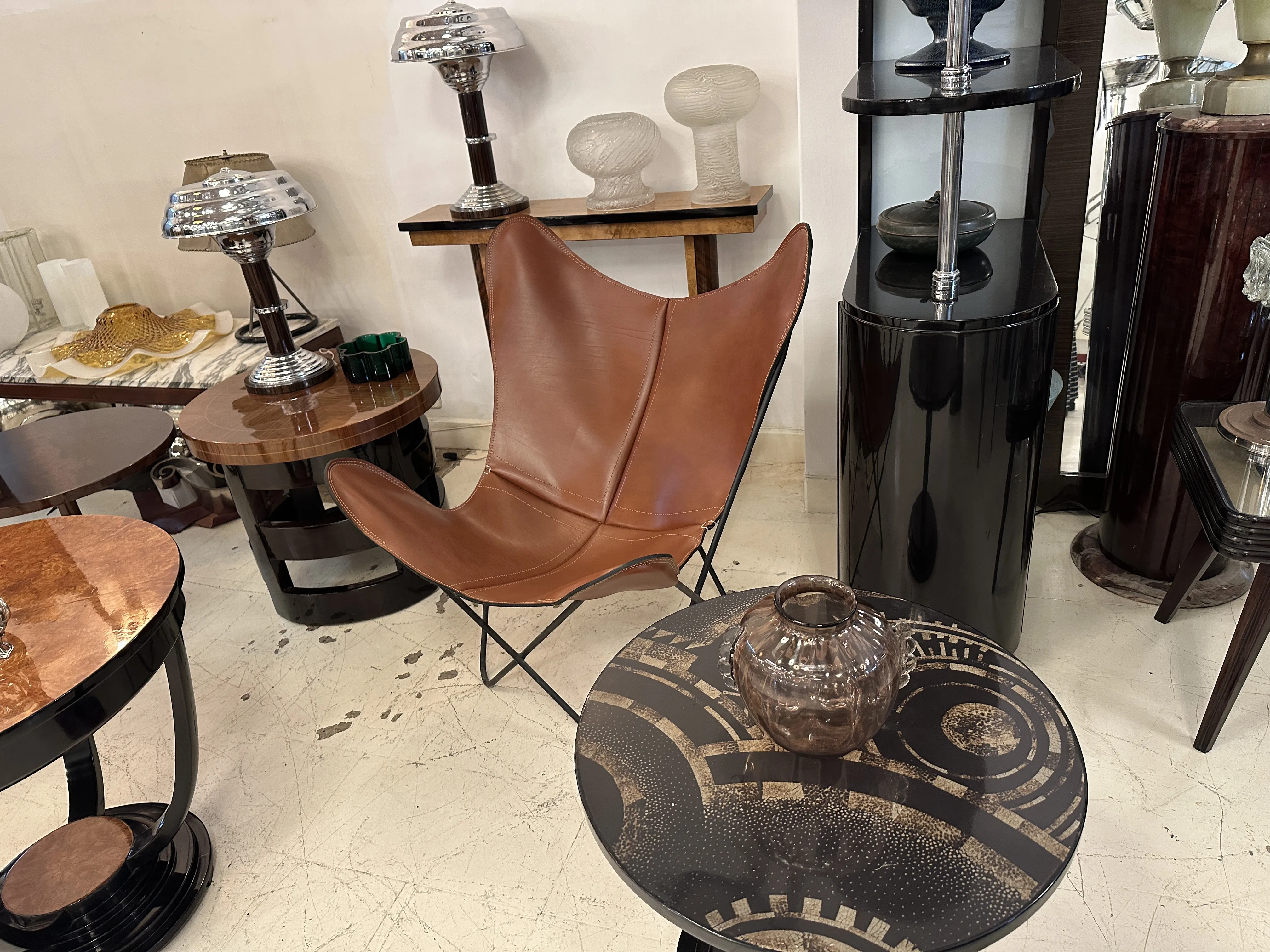 Murano vase on a decorative table with other items