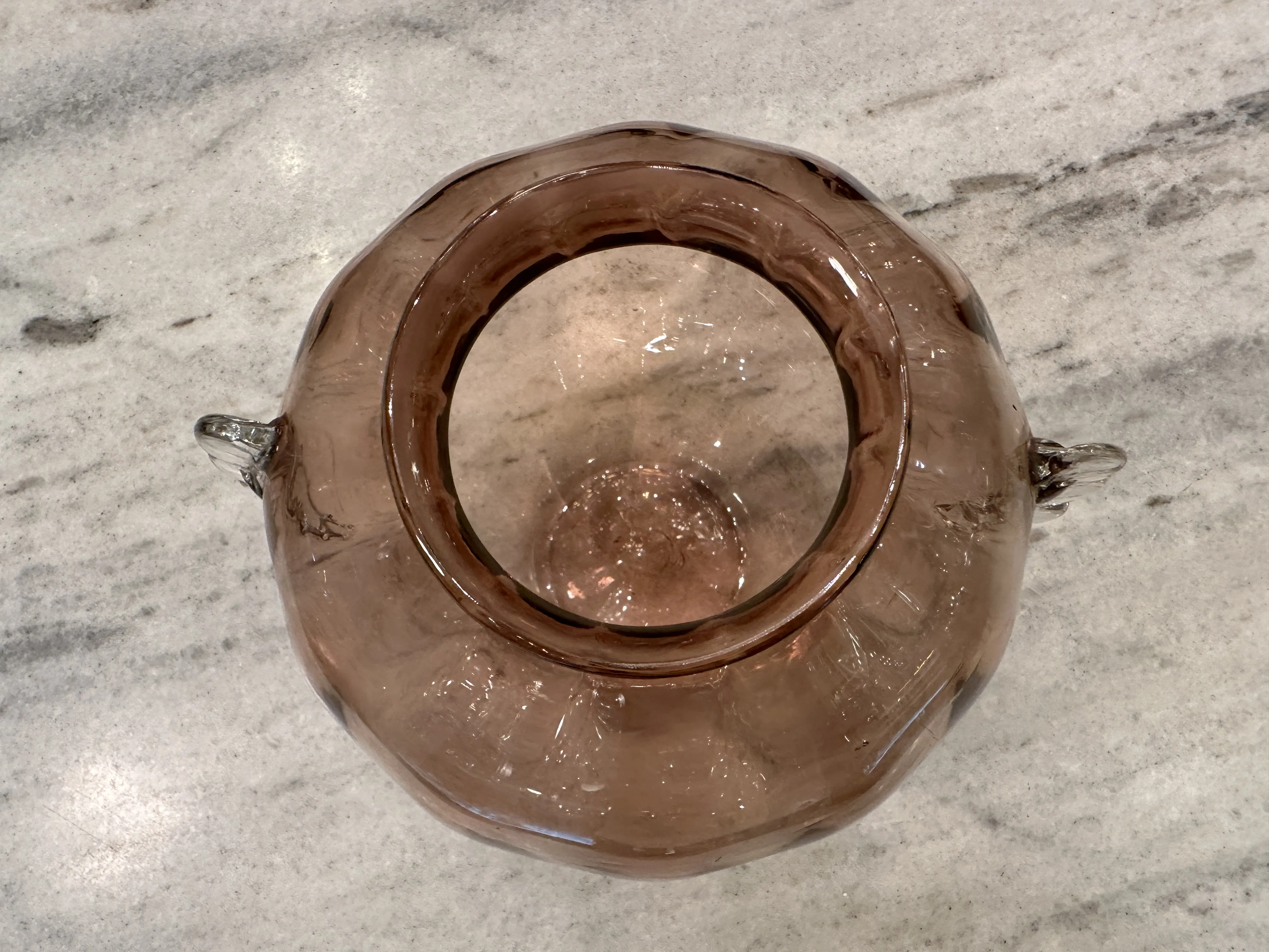 Antique Murano vase in brown color with rounded shape, adorned in an elegant setting.