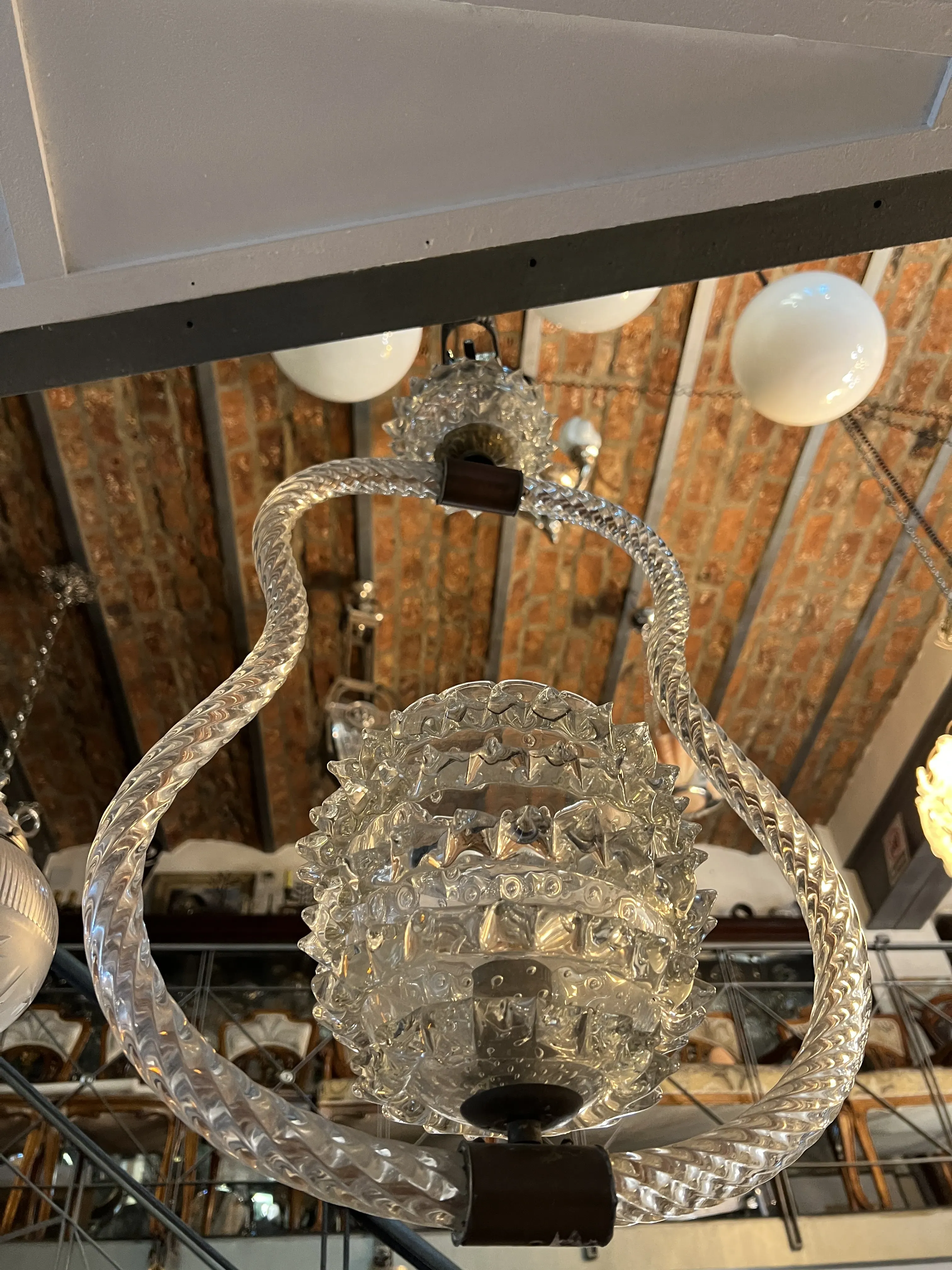 Antique hanging lamp with distinctive Mazzega Murano design in a decorative setting