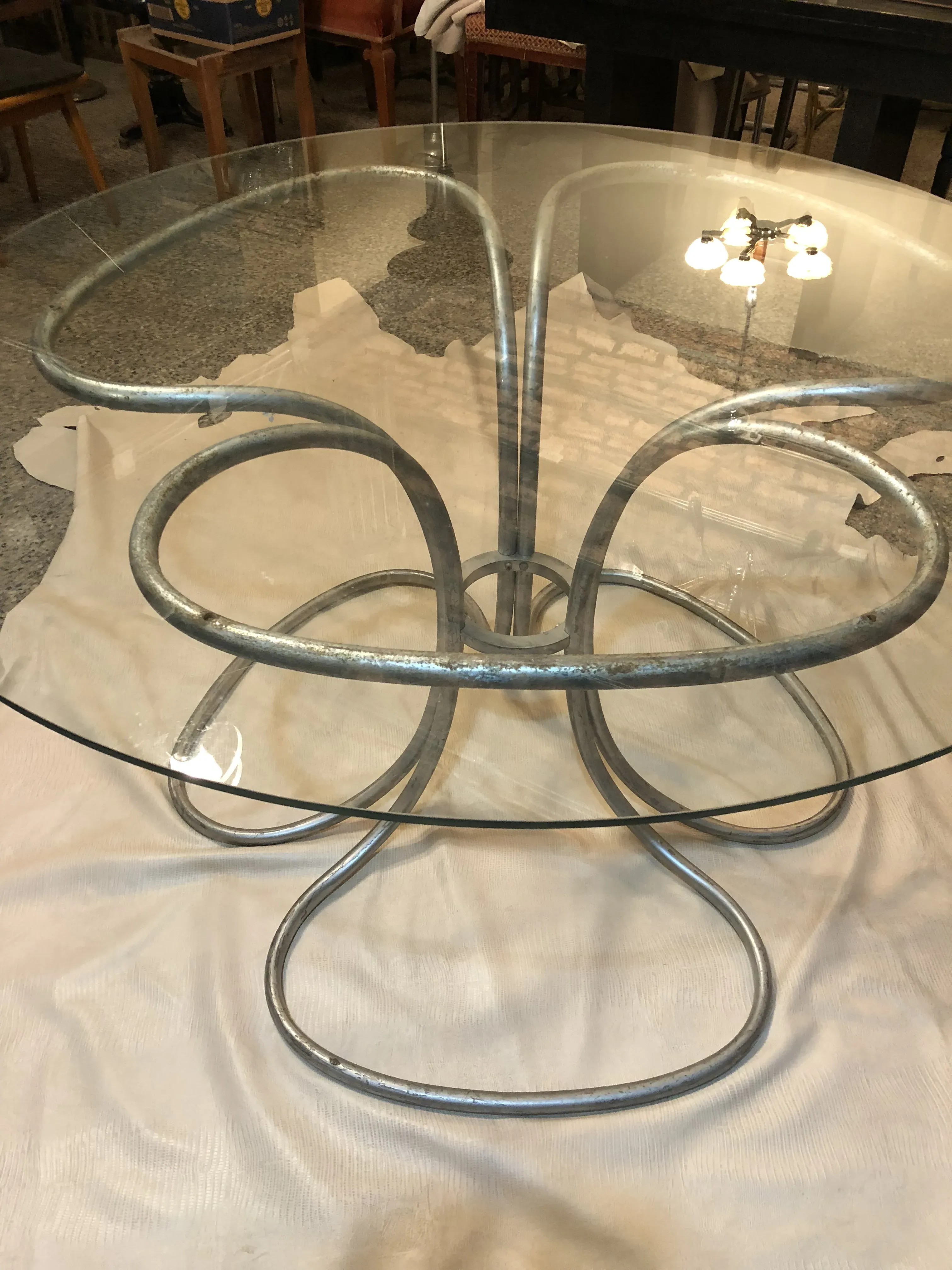 Antique dining table for 6 people in a cozy setting.