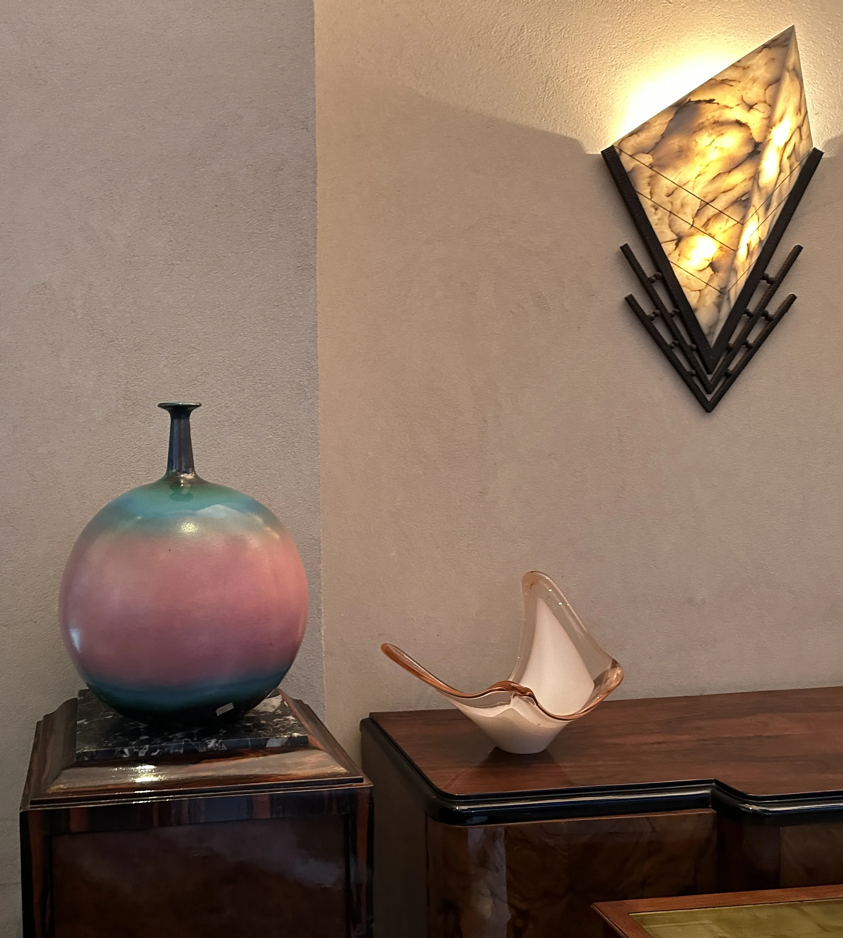 antique pair of sconces on the wall, soft light