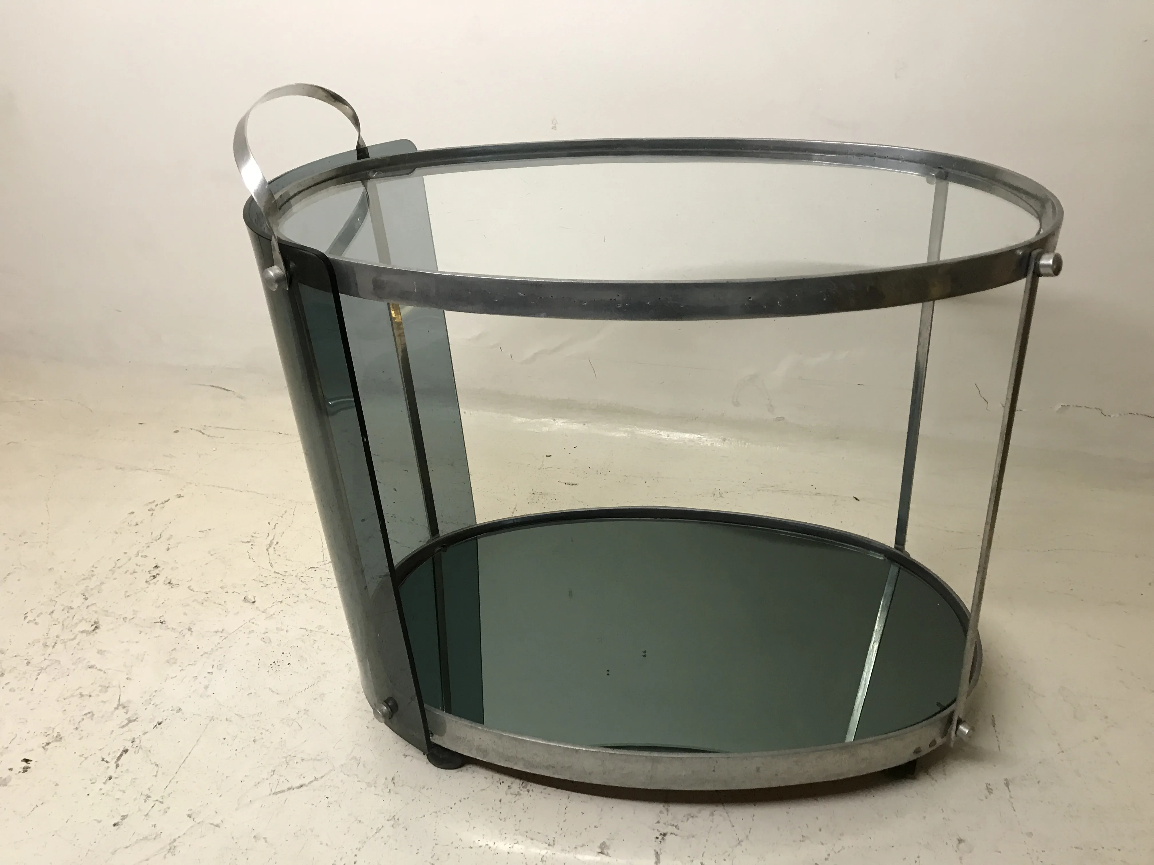 Antique cocktail trolley with elegant structure and mirror, Fontana Arte.