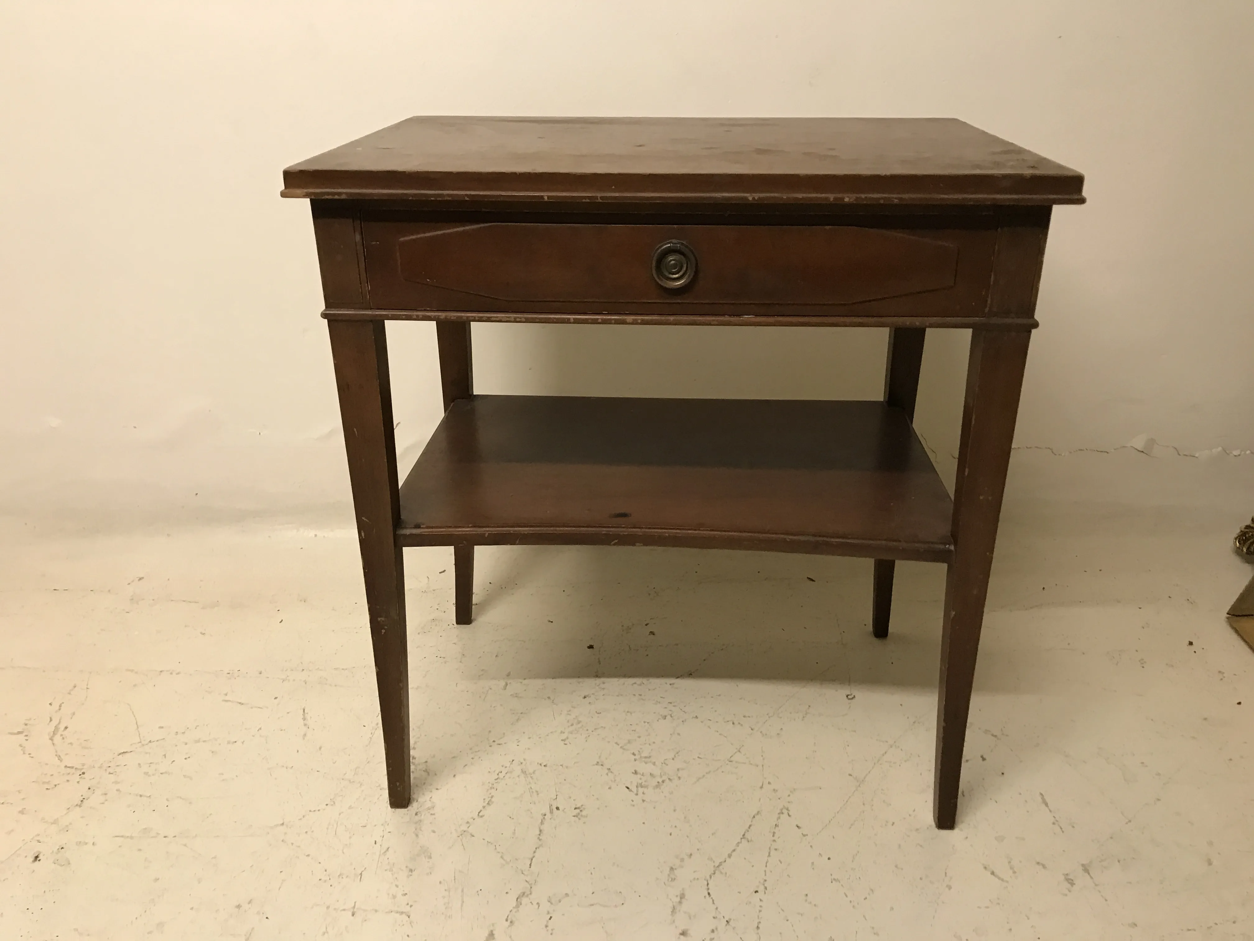 antique bedside table with classic design and a drawer, simple setting