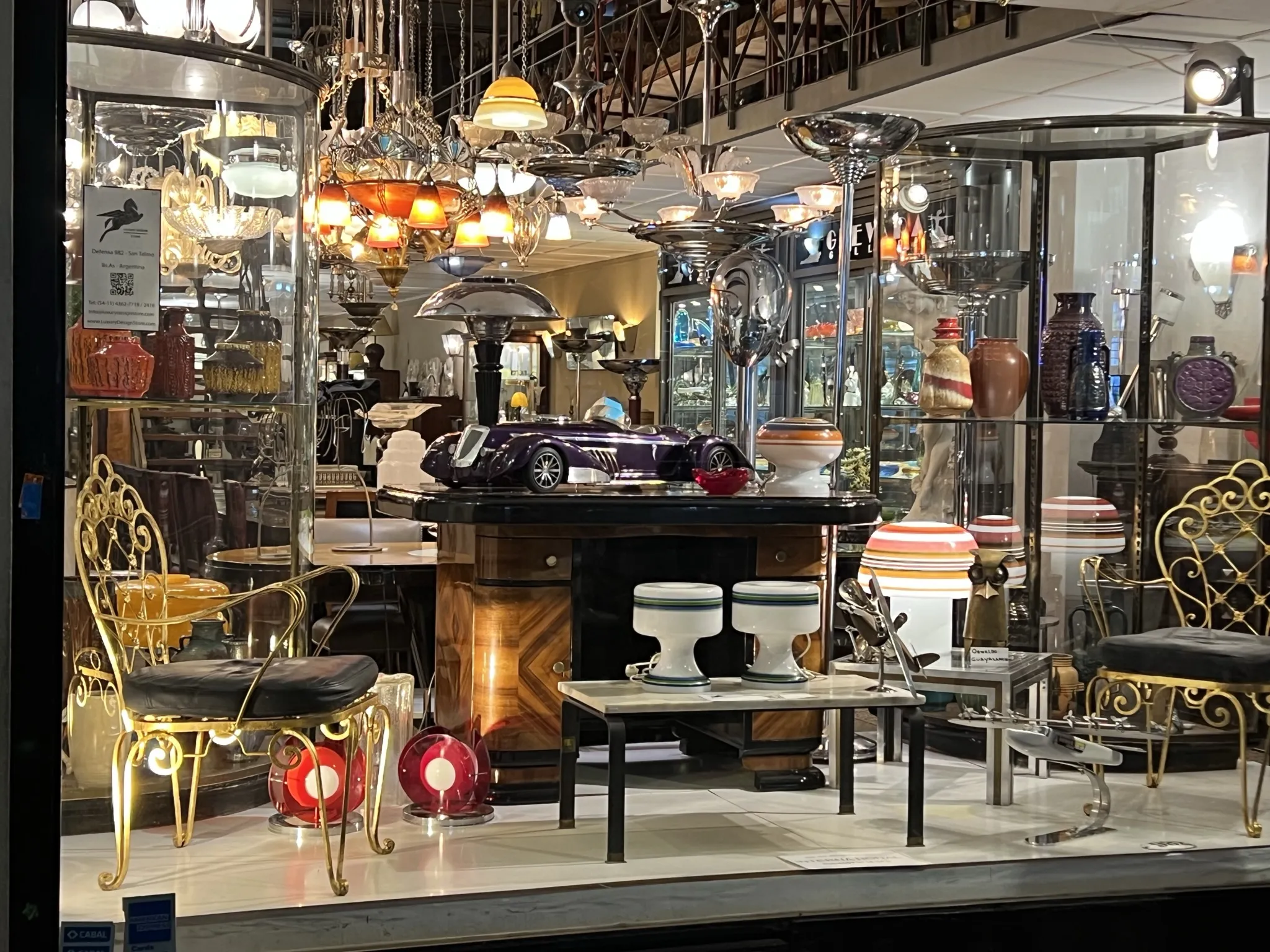 display of antique coffee table surrounded by lights and decor