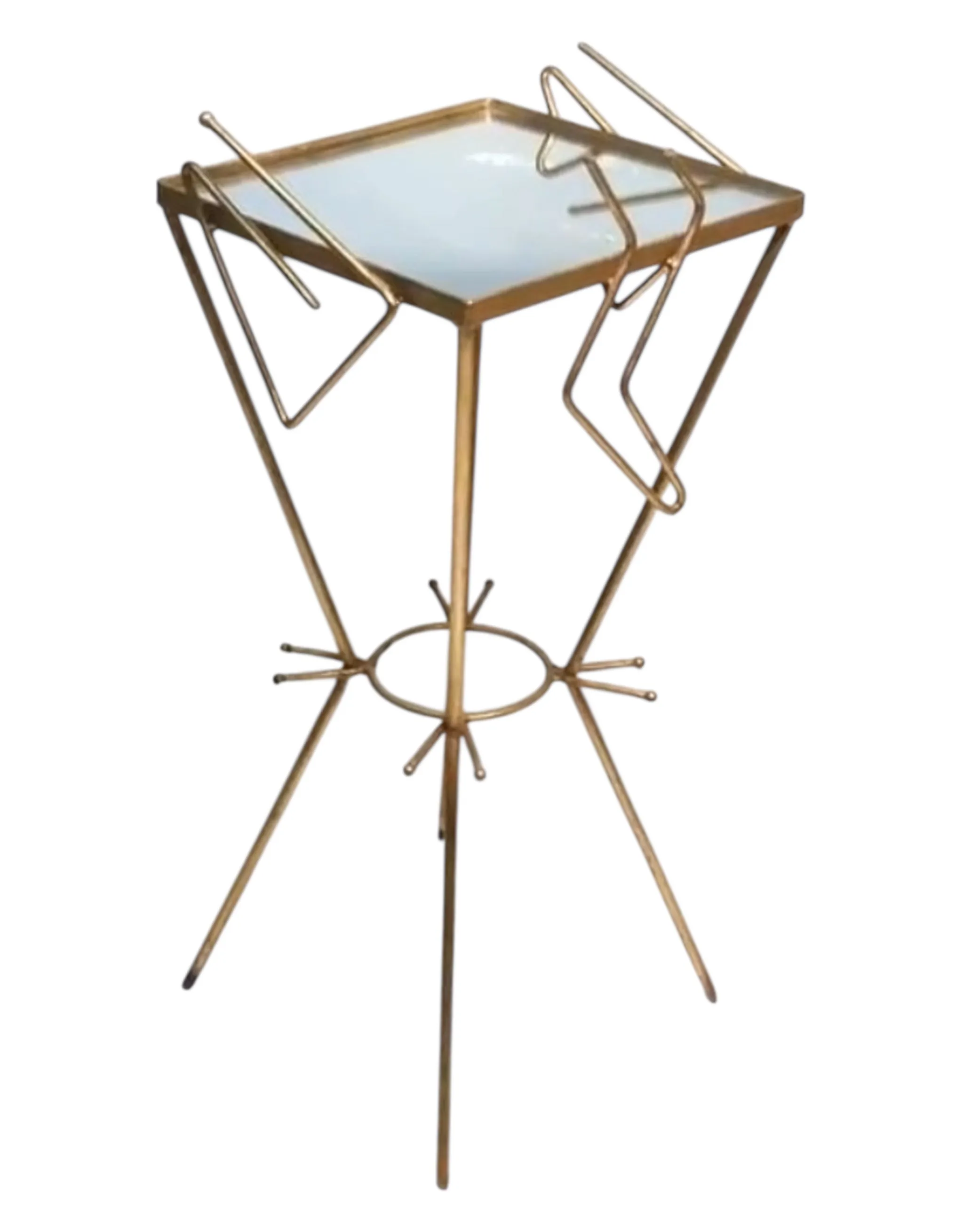 antique small table with distinctive legs and clear top