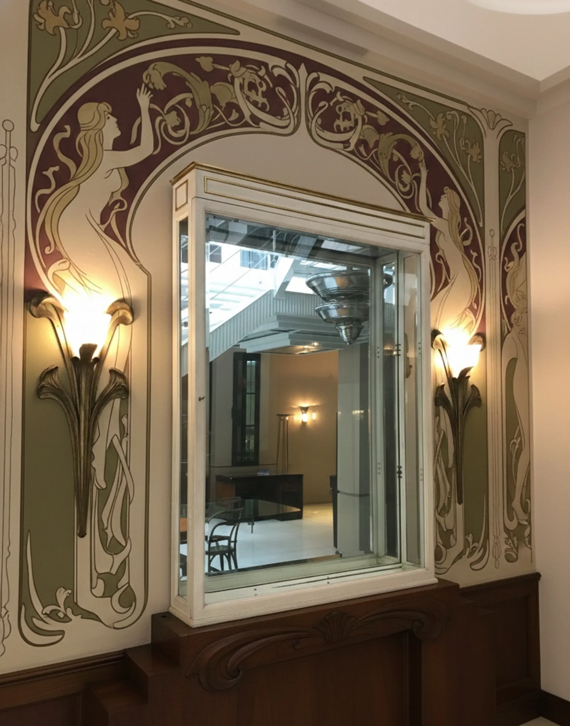 Antique display cabinet with decorative details and soft light