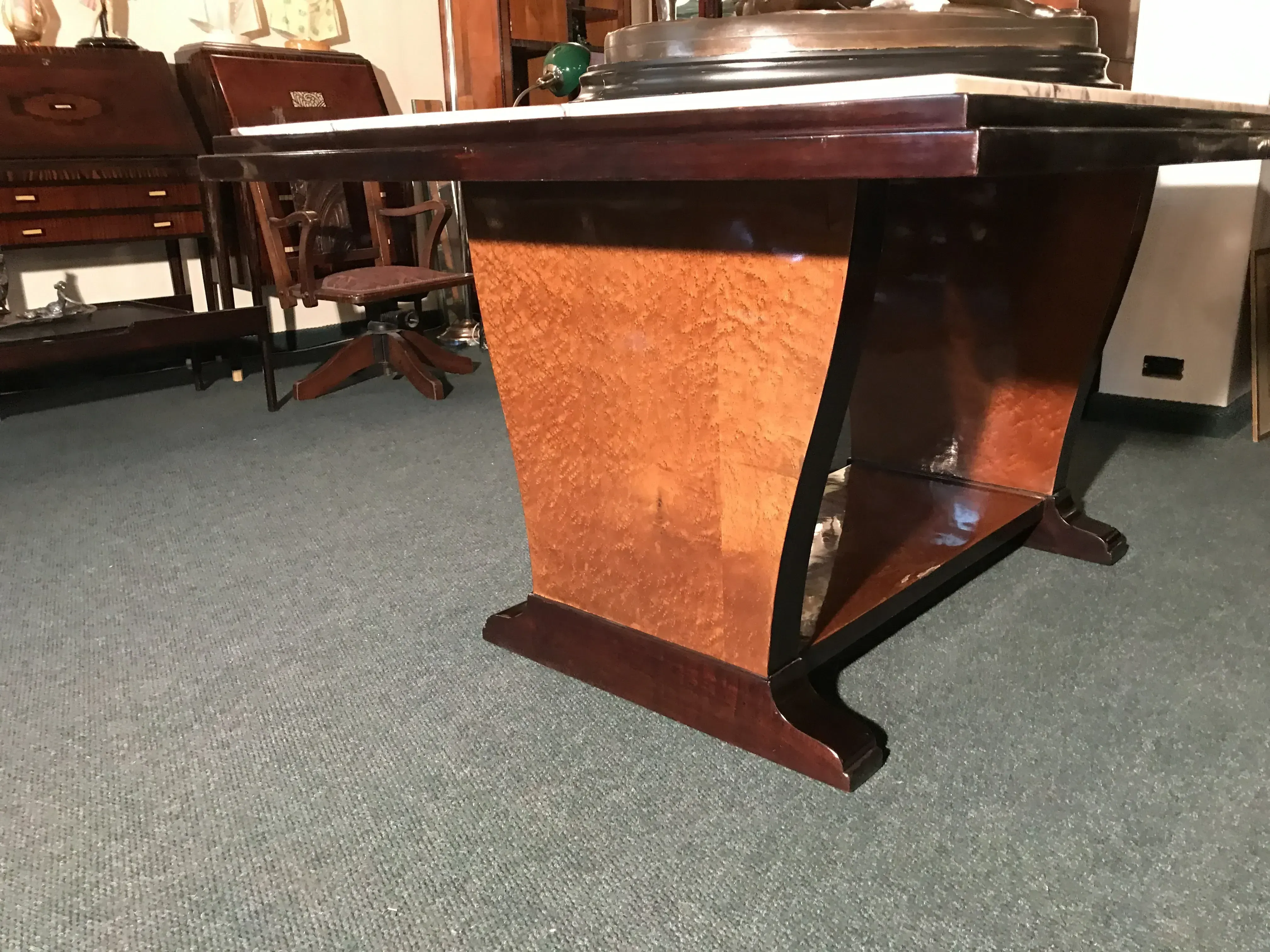 Antique Art Deco dining table for six people in a classic setting.