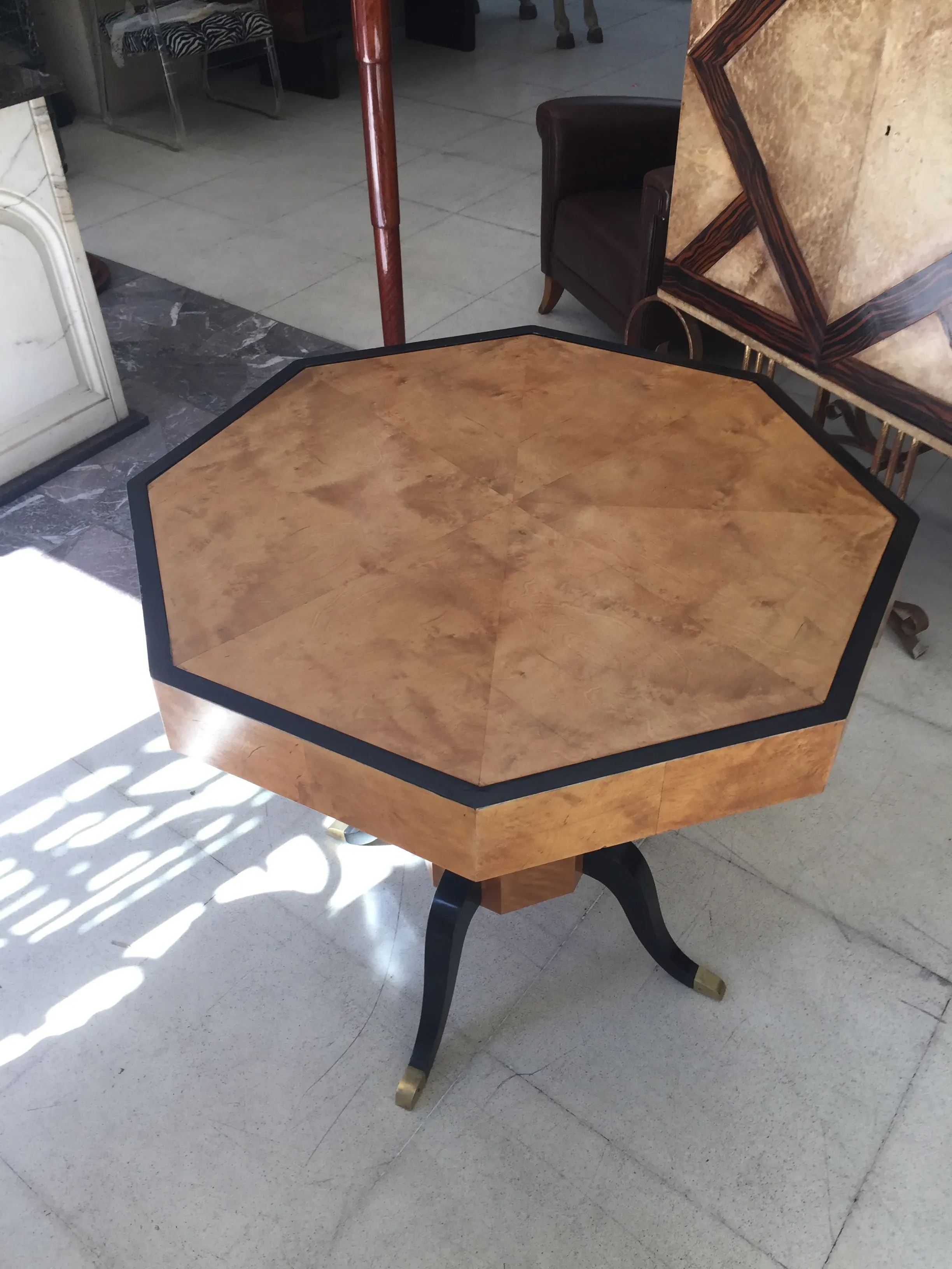 antique octagonal table for 4 in a stylish setting