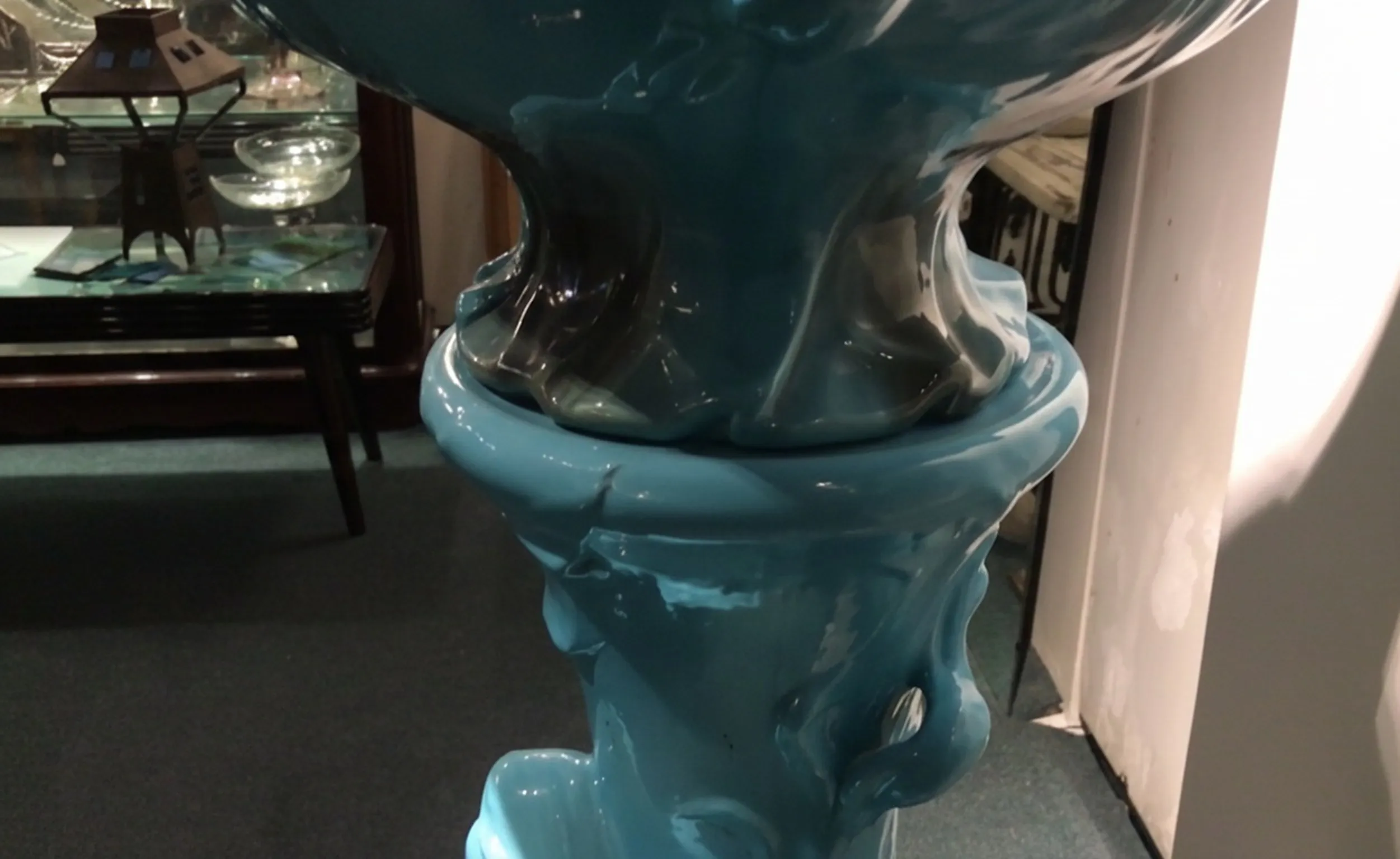 Antique blue planter with classic decoration.