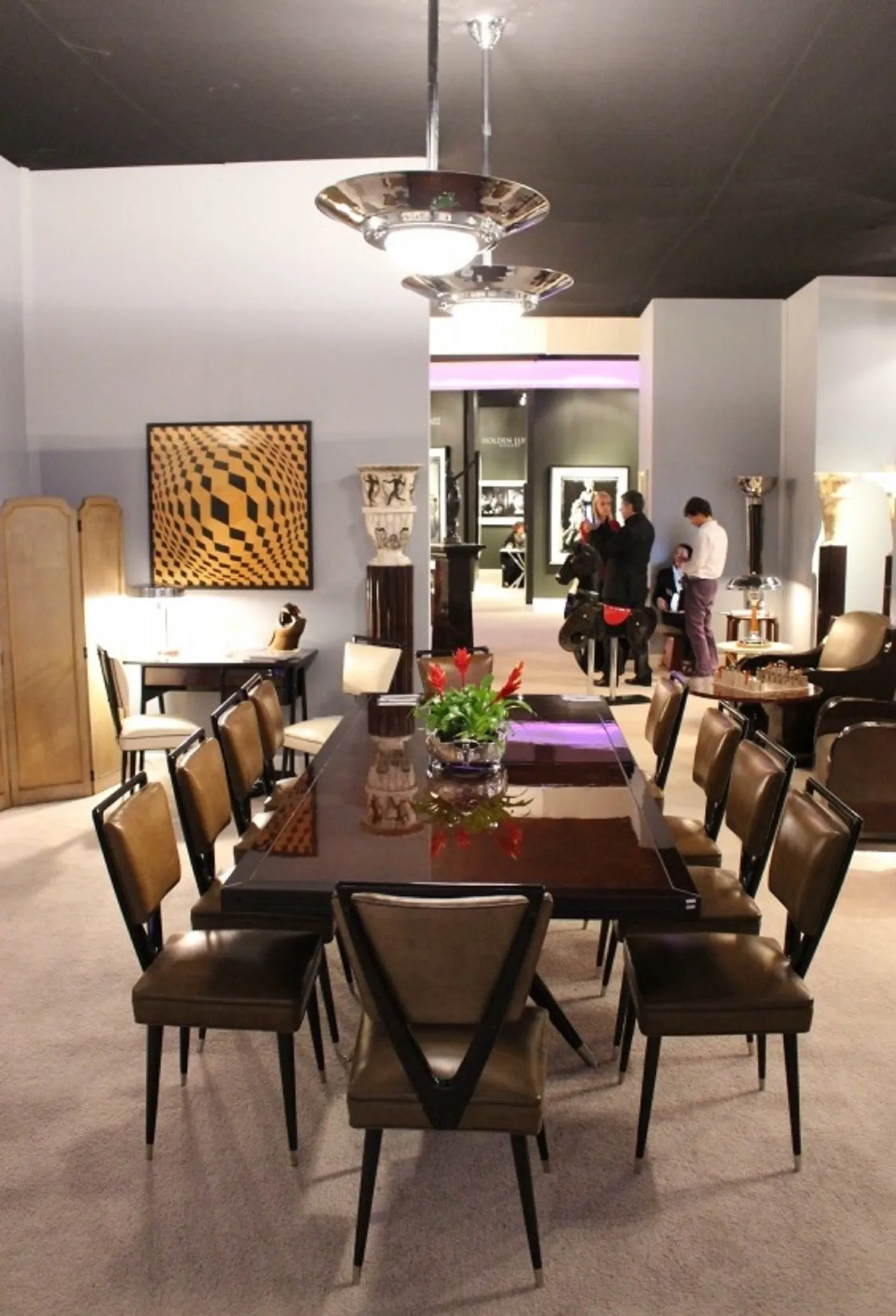 Eight antique chairs designed by carlo mollino in a stylish setting