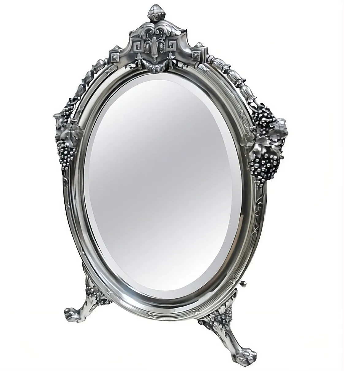 antique table mirror with a decorative frame and stand