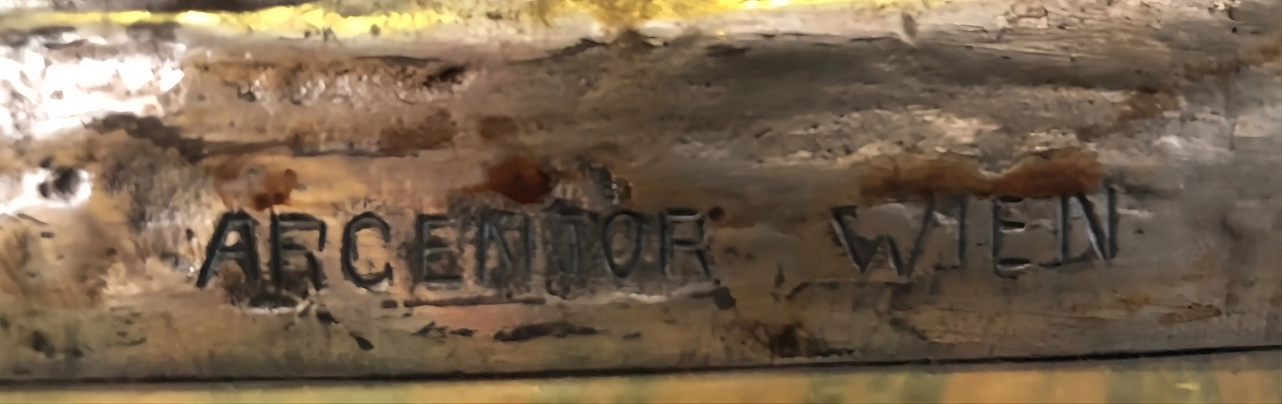 selo antigo Argentor Wien com inscrição visível