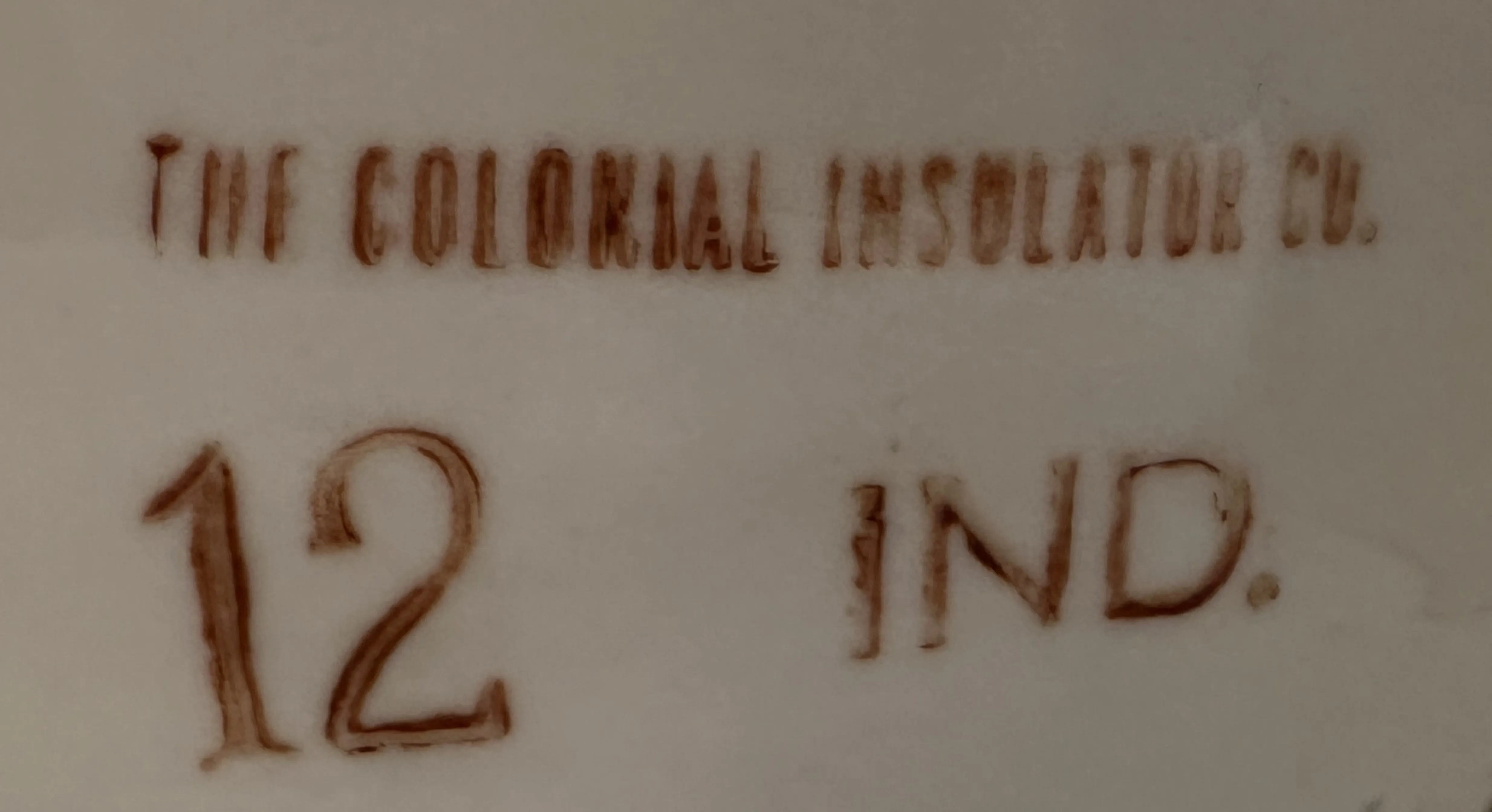 古董印章带有 colonial insulator 公司的文字