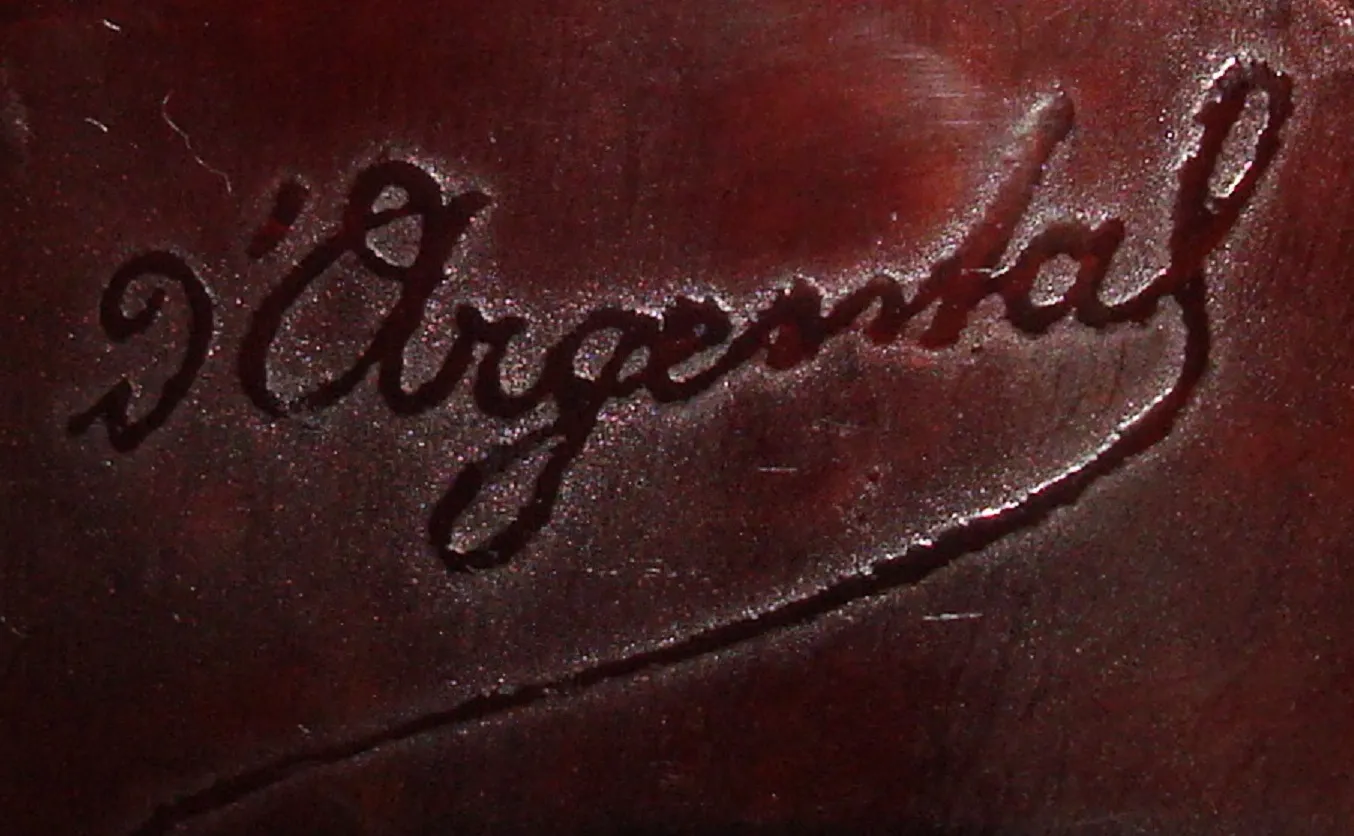 antikes Siegel D'Argental mit eleganter Unterschrift auf dunklem Hintergrund