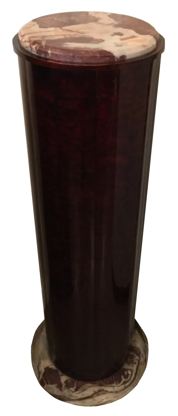 antique column with a shiny finish and decorative top