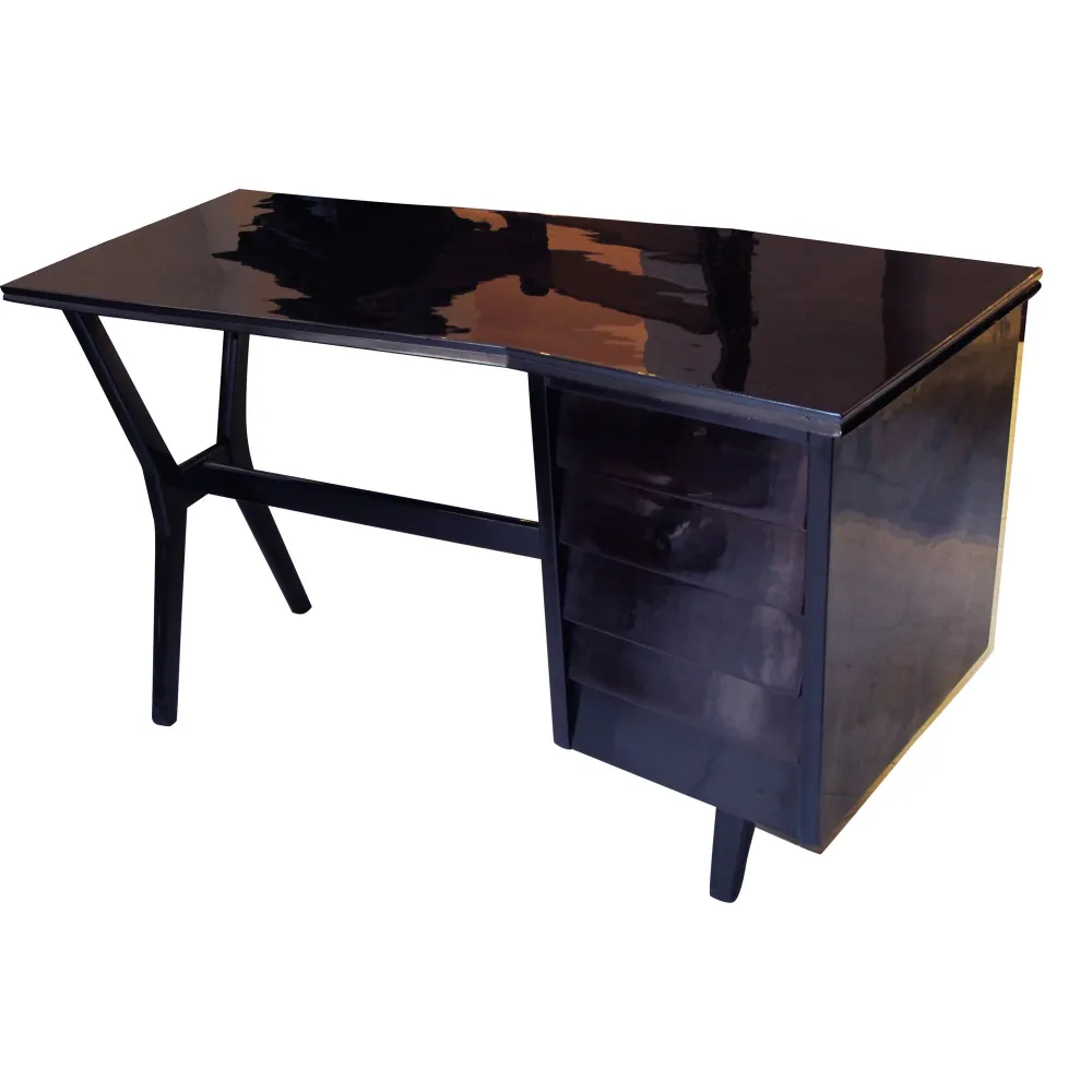 antique black desk with an elegant and functional design. Includes drawers for storage.