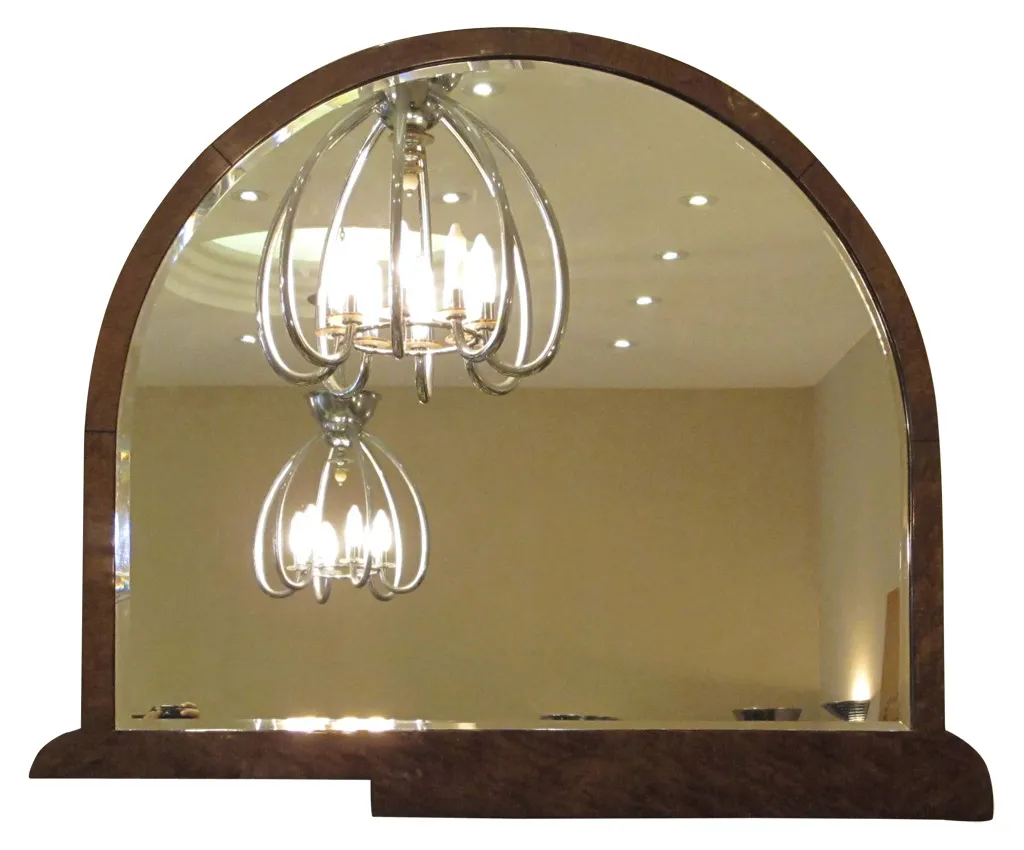 antique arched mirror in an elegant setting