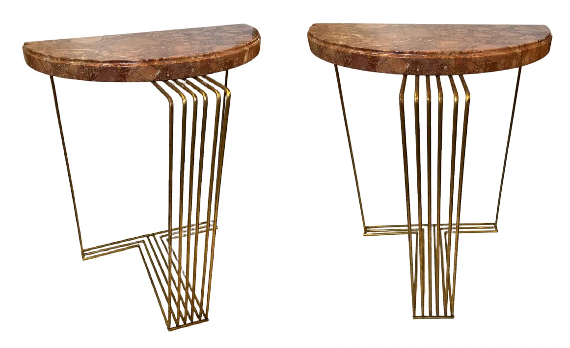 view of two antique consoles with slim, elegant legs