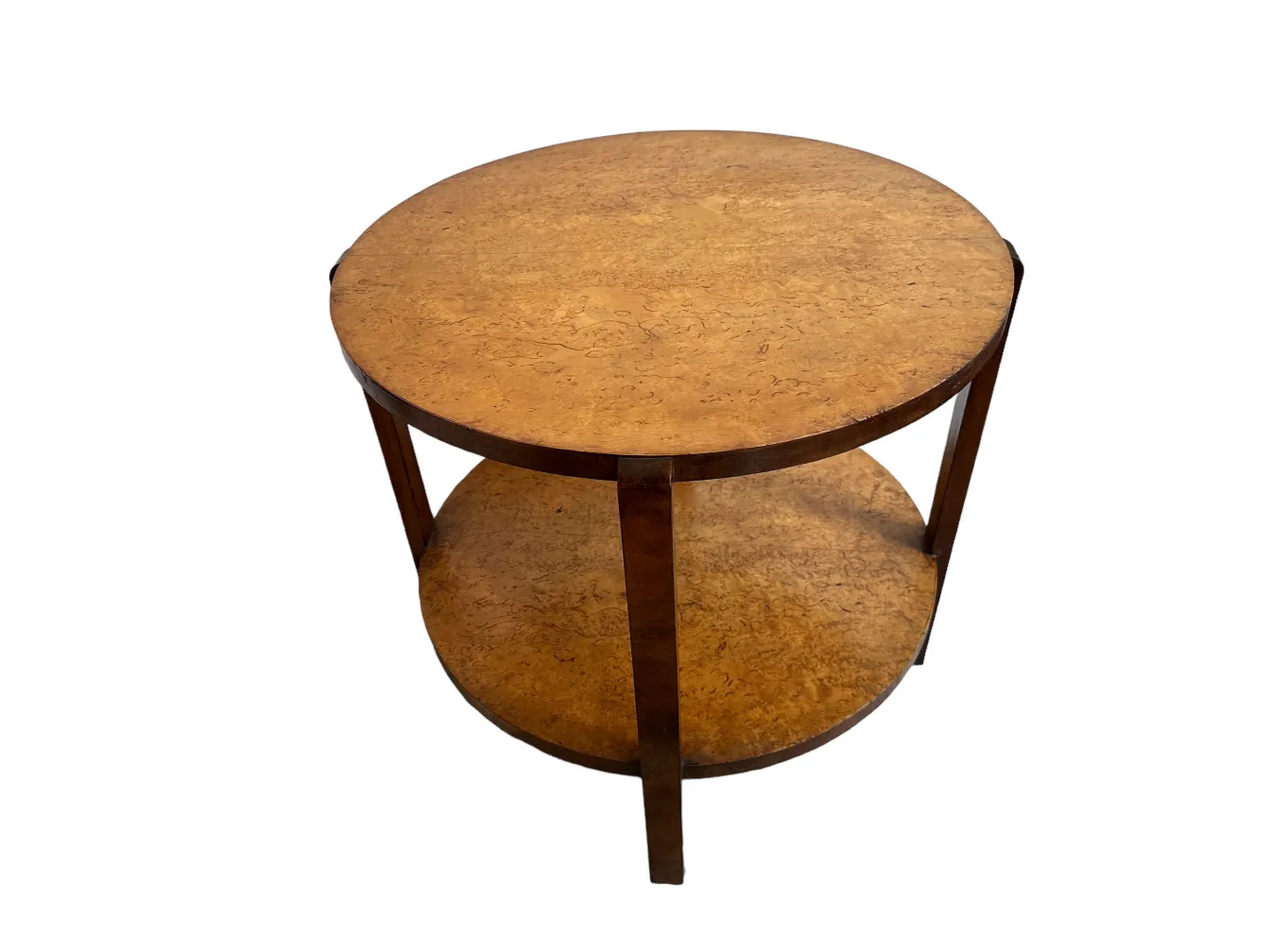 antique round small table with two tiers in a simple environment